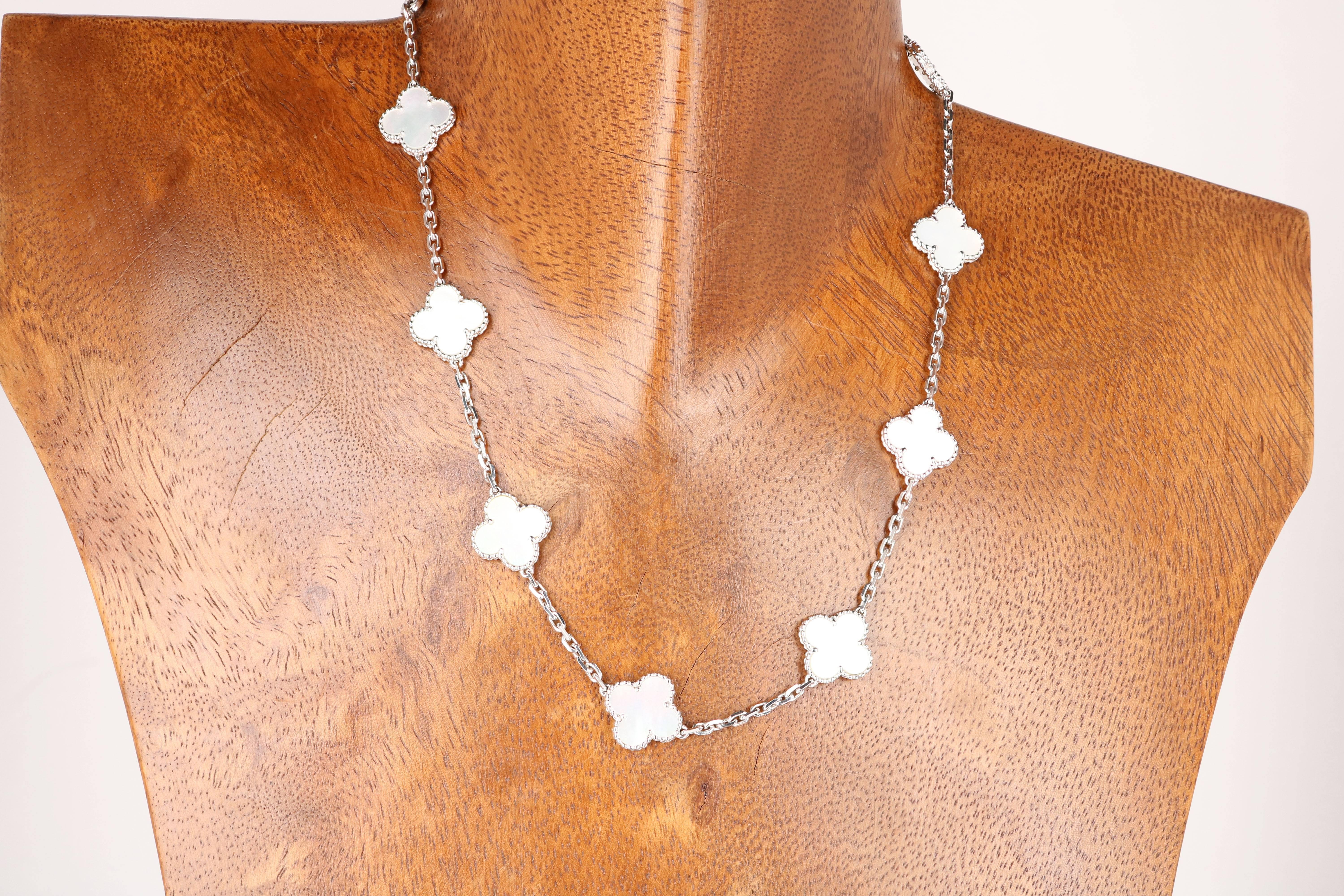 Van Cleef & Arpels Mother Of Pearl Vintage Alhambra Necklace in 18K white gold
Serial #BL213505 Stamped VCA  16.50
With Original Van Cleef & Arpels Folder