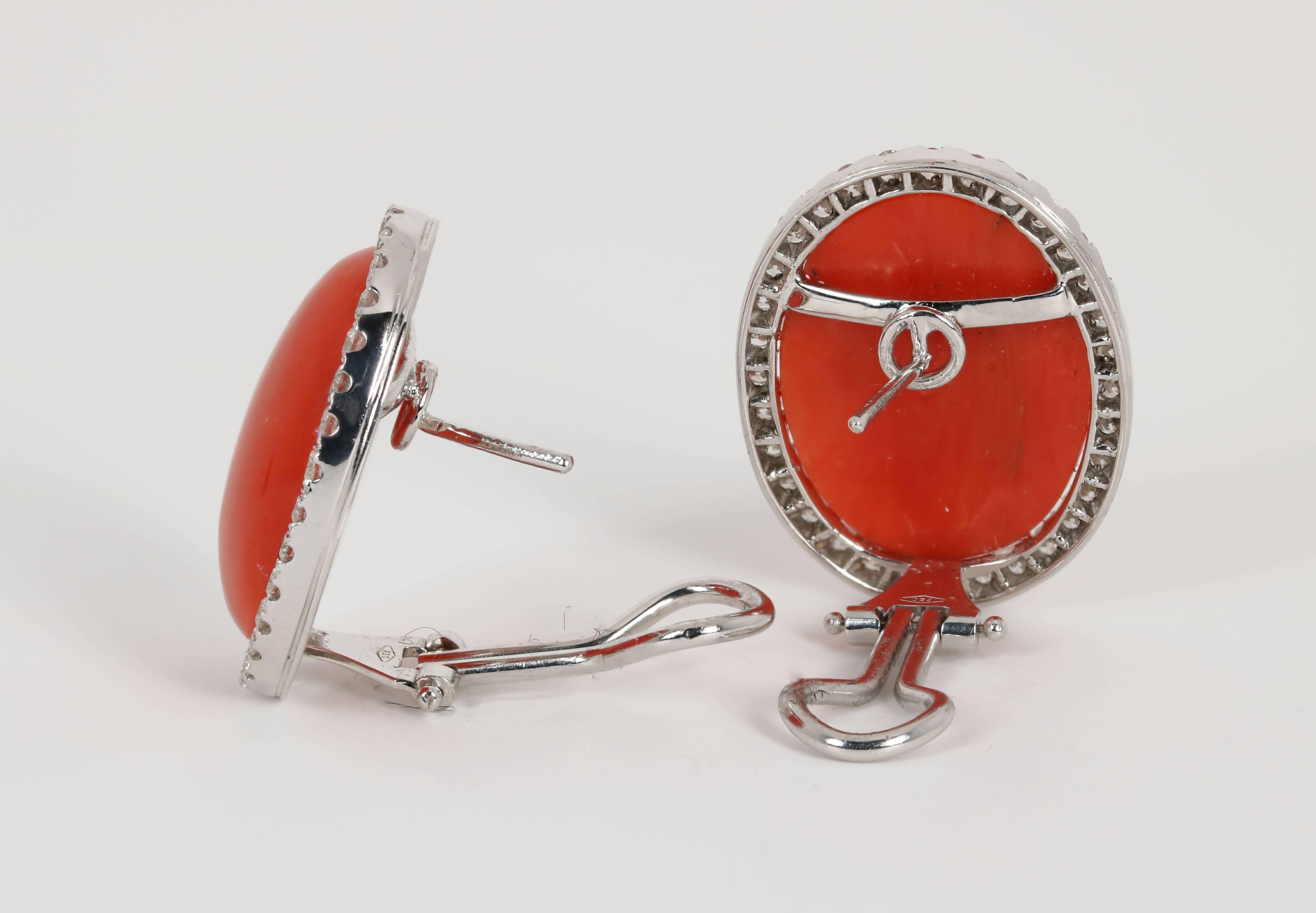 18K white gold coral and diamond earrings
26 carats of coral, 2 carats of diamonds