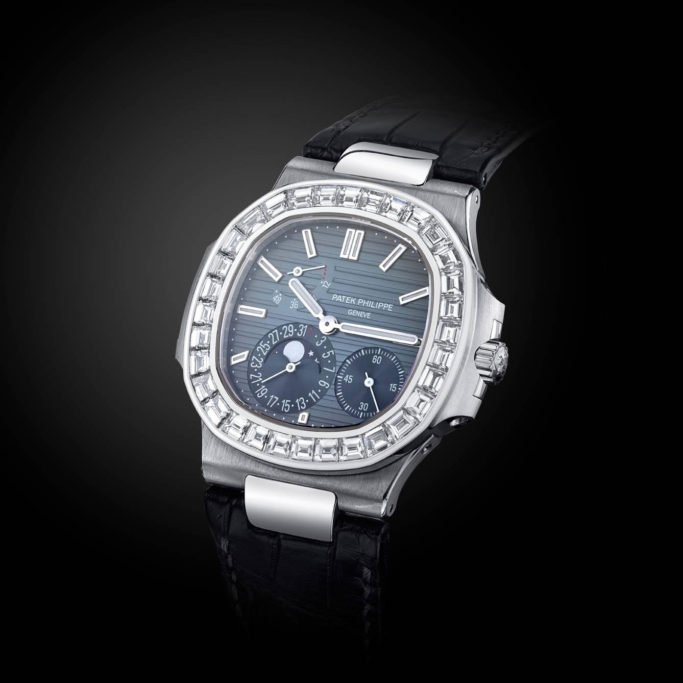 Patek Philippe Nautilus Special Edition watch with black crocodile strap and 18K white gold set with bezel set diamonds
Serial 3179xxx   240/164 Model 5722 Case Number 4465xxx
With Box and Paperwork