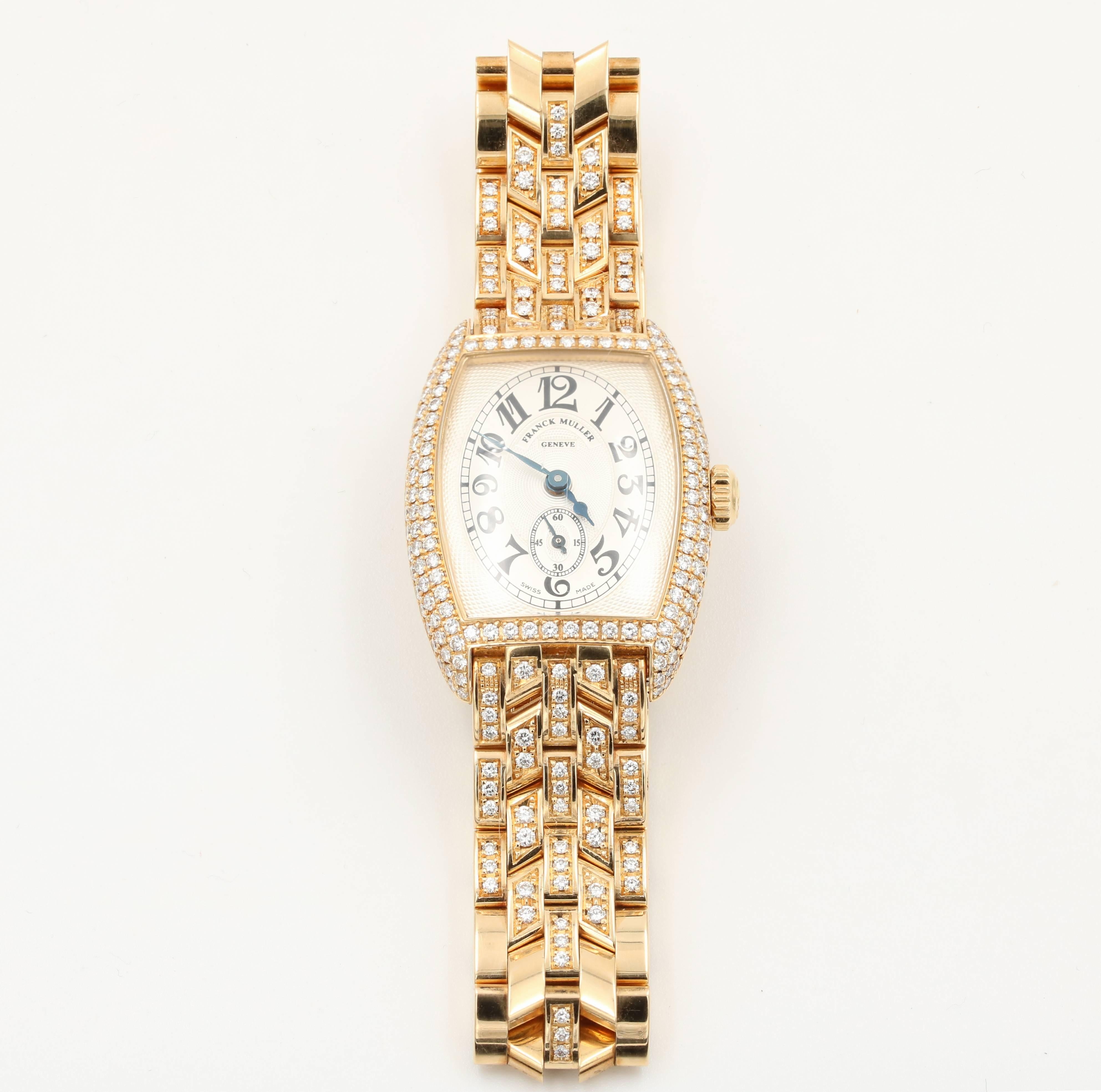 Franck Muller Chronometro Ladies 18K yellow gold and Diamond Watch
Includes Original Box and Paperwork and extra links
Montre Cintrée Curvex
163 Round Diamonds 1.72 carats
Rare movement, Mechanical Anchor
21600 vibrations per hour
Diameter of the