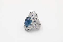GIA Certified 21.98 carat Burmese Sapphire and Panther-style Diamond Ring
