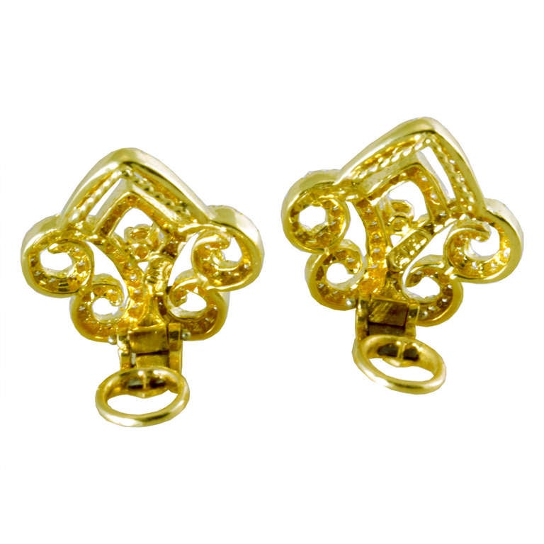 Henry Dunay earrings in 18K yellow gold featuring 1.36 ctw. in diamonds.