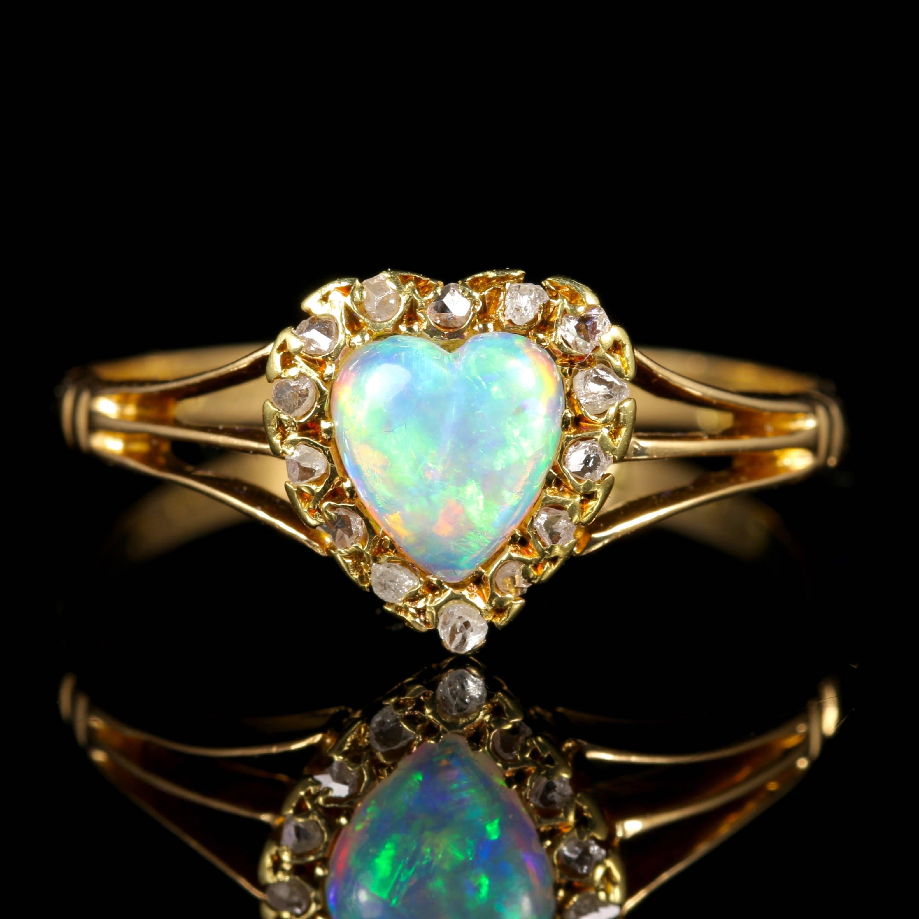 This has to be one of the sweetest Edwardian heart Opal and rose cut Diamond rings we have exhibited for sale in its original box.

Fully hallmarked Chester 1908.

A fabulous Victorian 18ct Yellow Gold ring which depicts a rich coloured natural Opal