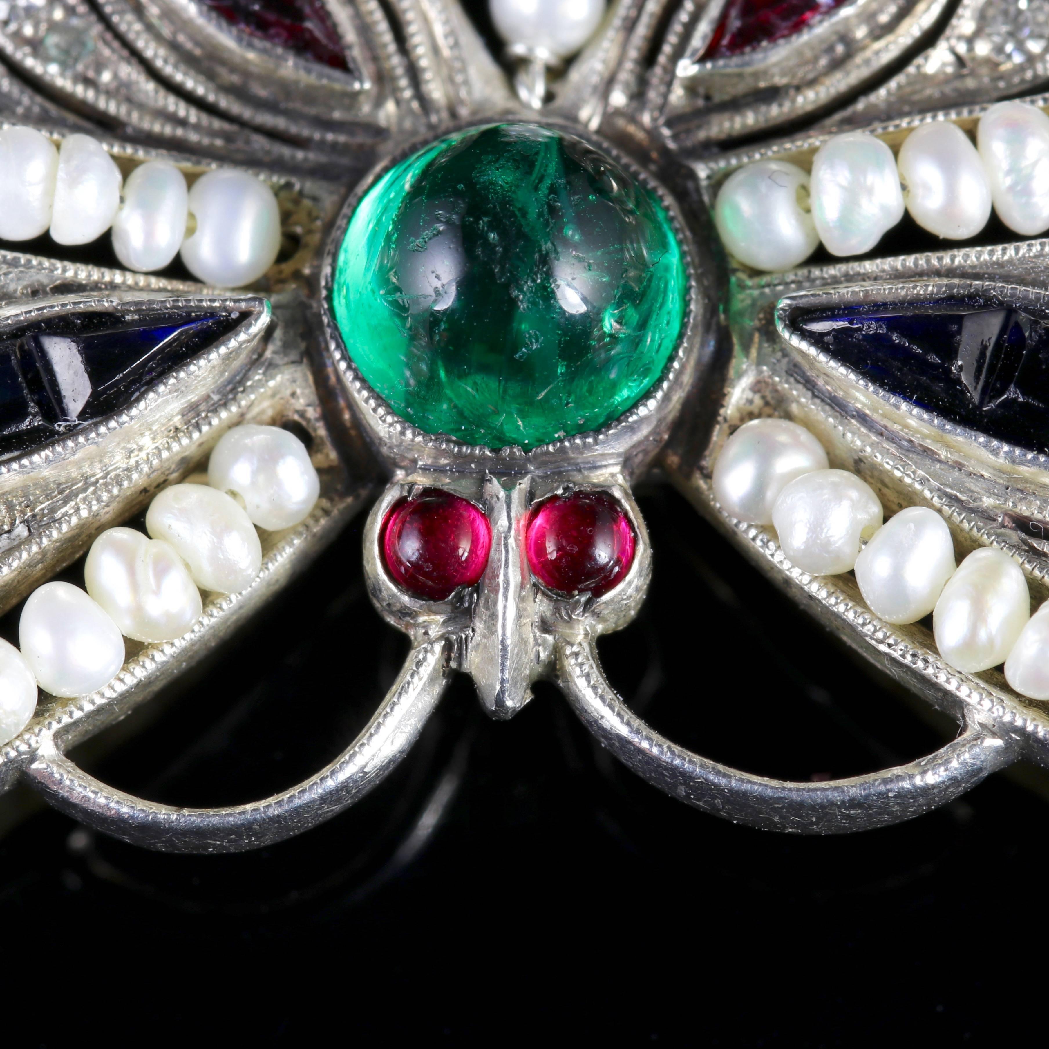 This beautiful Butterfly Brooch boasts beautiful coloured Paste Stones and Pearls, all set in Sterling Silver.

A stunning Victorian piece, Circa 1900.

Sparkling old cut Paste Stones adorn the Butterflies eyes, wings and body with a deep emerald