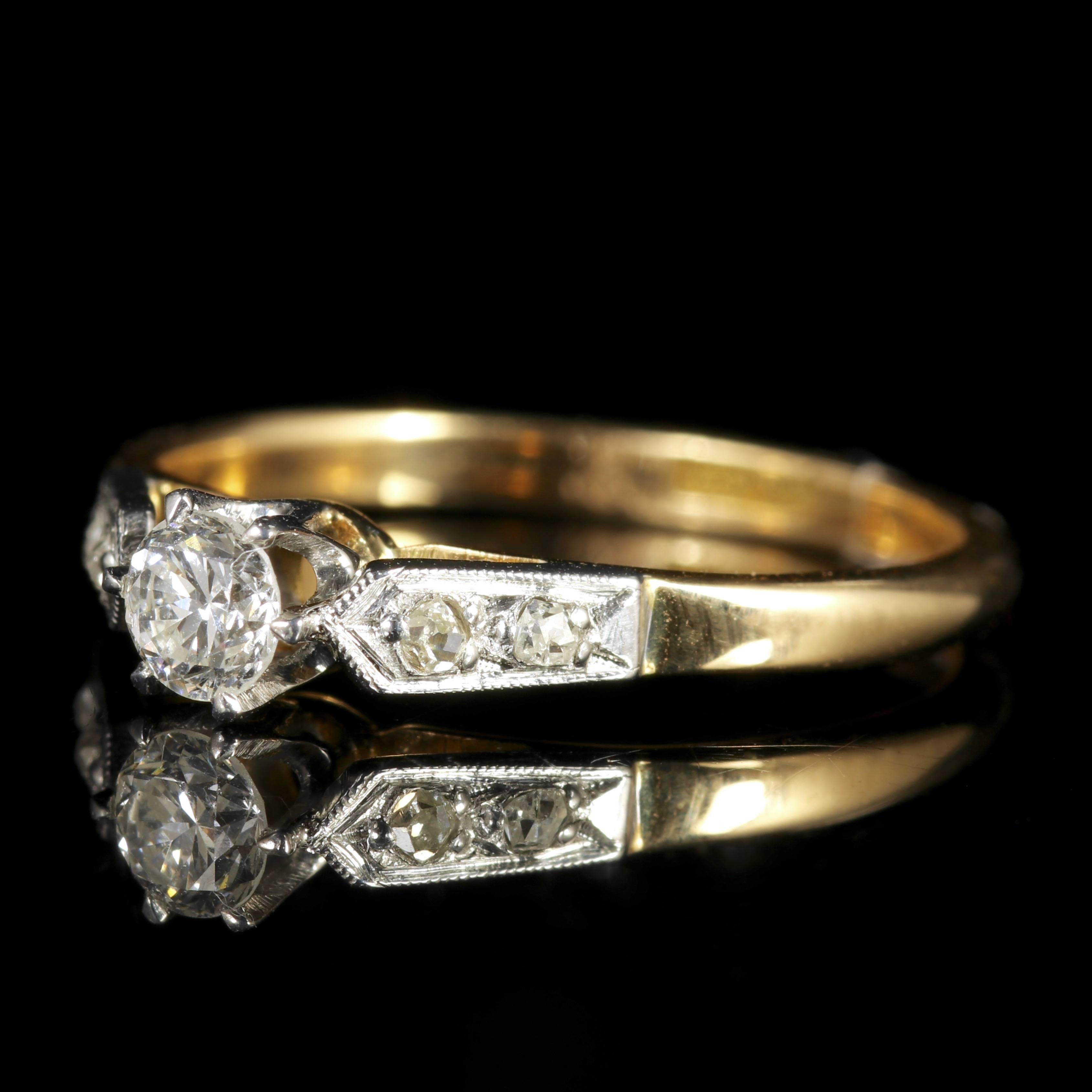 This genuine antique Edwardian Diamond ring is Circa 1915.

The lovely ring is set in 18ct Yellow Gold and Platinum, hallmarked 18CT.

The central Diamond is 0.23ct in size with smaller Diamonds chasing down each shoulder.

Diamond is the hardest