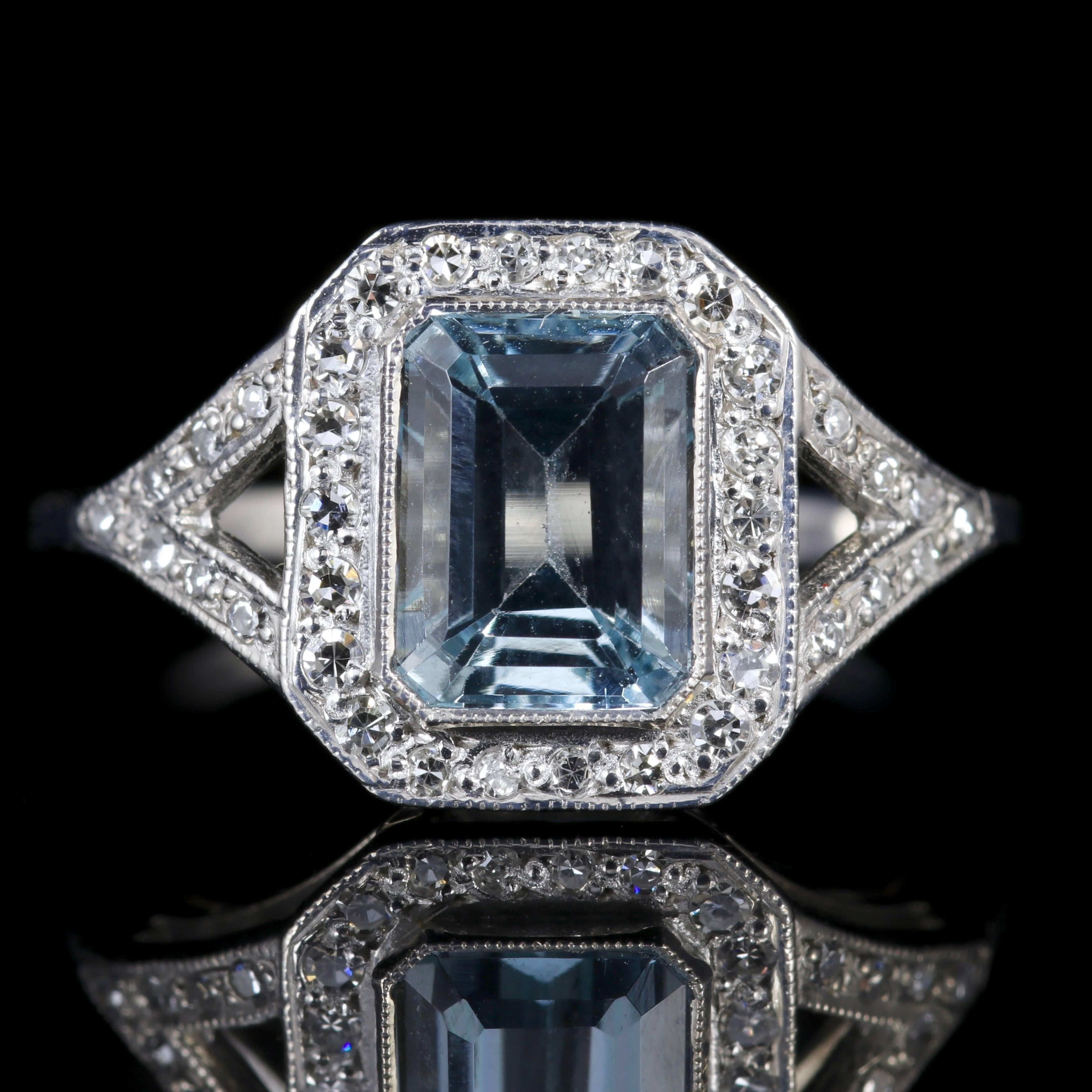 This fabulous 18ct White Gold ring is boasting a 2.50ct emerald cut Aquamarine which is surrounded by old cut Diamonds.

The sky blue of the Aquamarine makes it one of the favourite gemstones of most women in the world, as it complements most skin