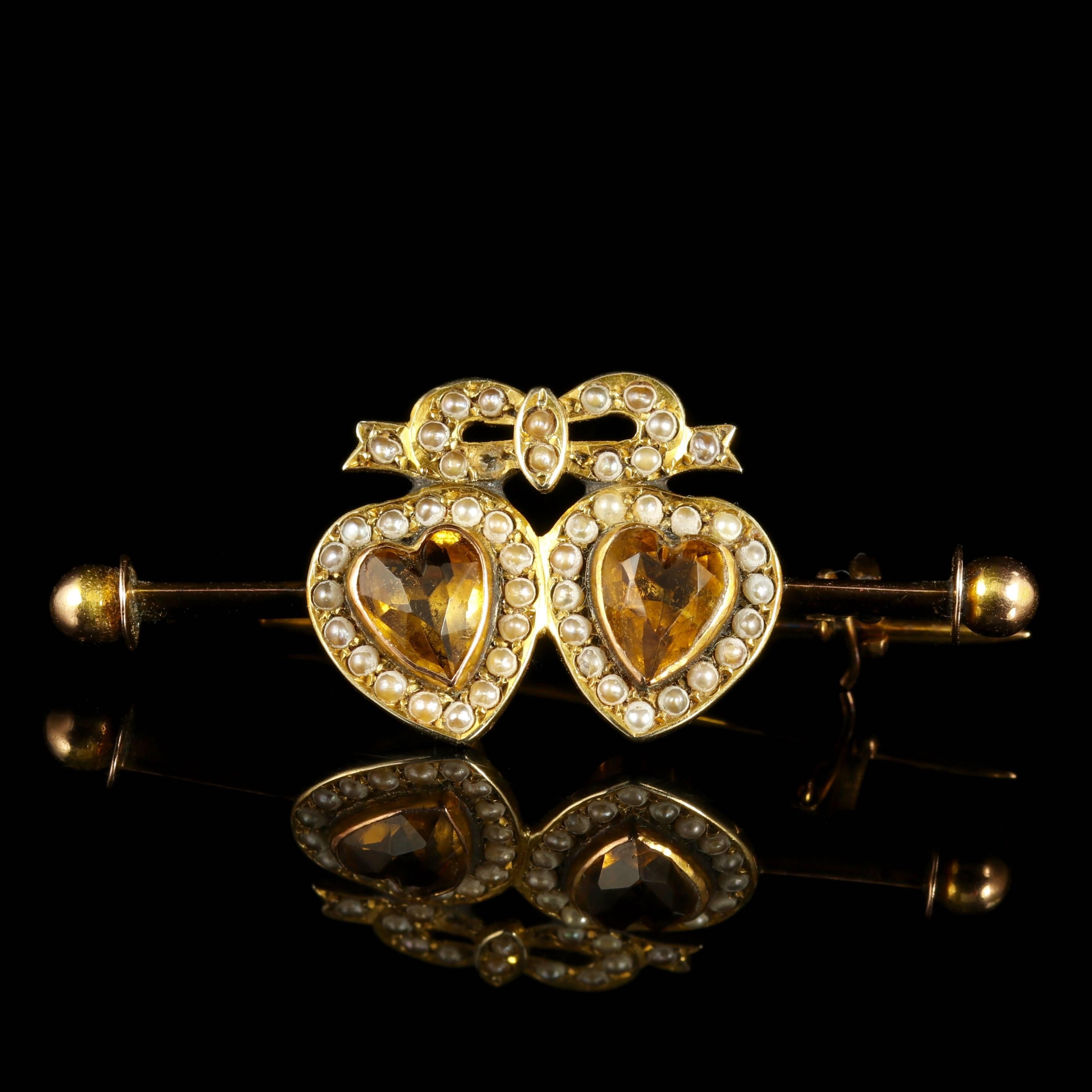 This fabulous antique double sweet heart Citrine heart brooch is set in 9ct Yellow Gold.

Each Citrine is 0.8ct and hand cut into lovely hearts that are polished beautifully.

The Citrine’s sparkle and have a crisp, radiant quality about them. 

The