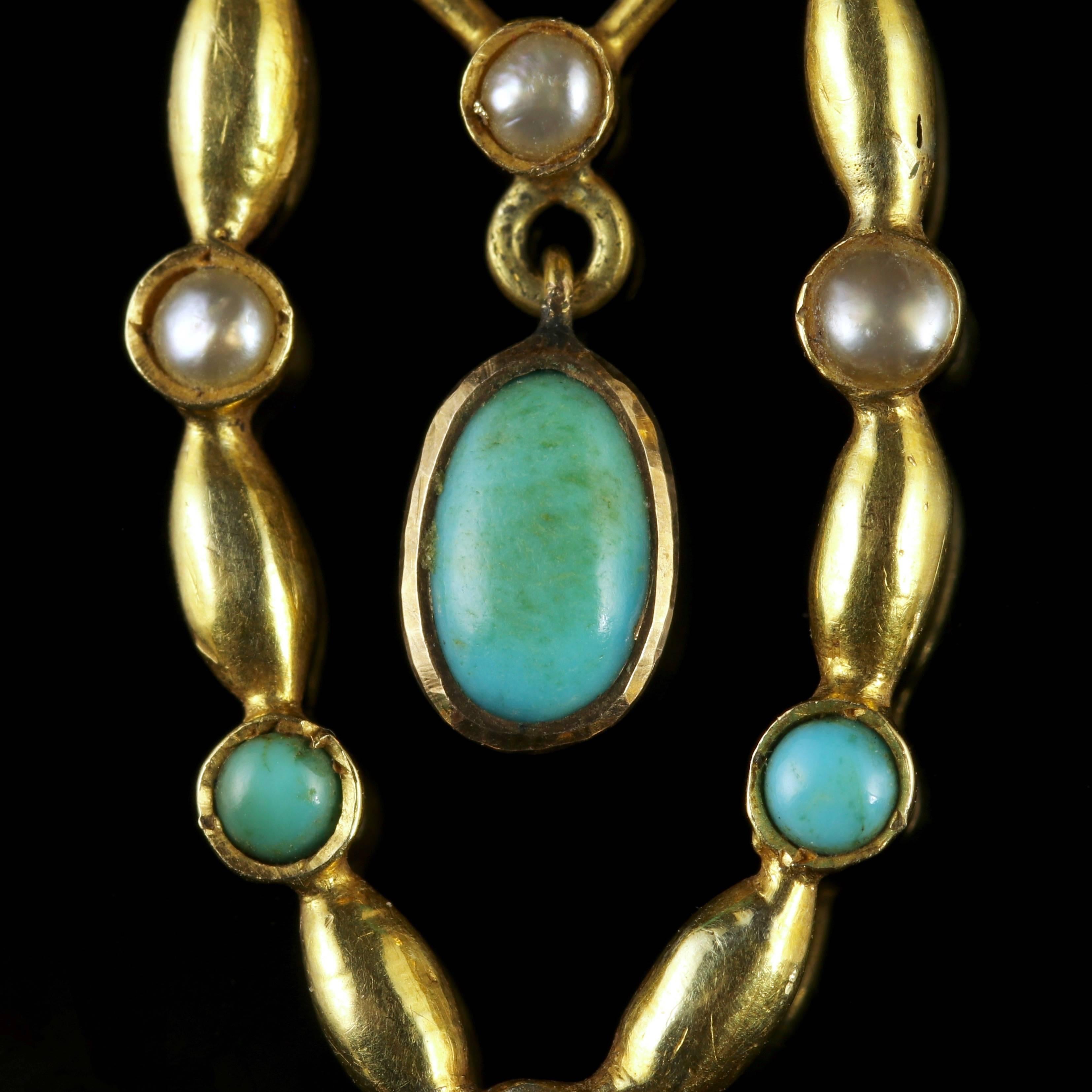 This beautiful antique Victorian 15ct Yellow Gold pendant is adorned with Turquoises and Pearls. 

A genuine Victorian piece, Circa 1880. 

The pendant has two fabulous droppers each crowned with Turquoise stones.

The Turquoise is said to have