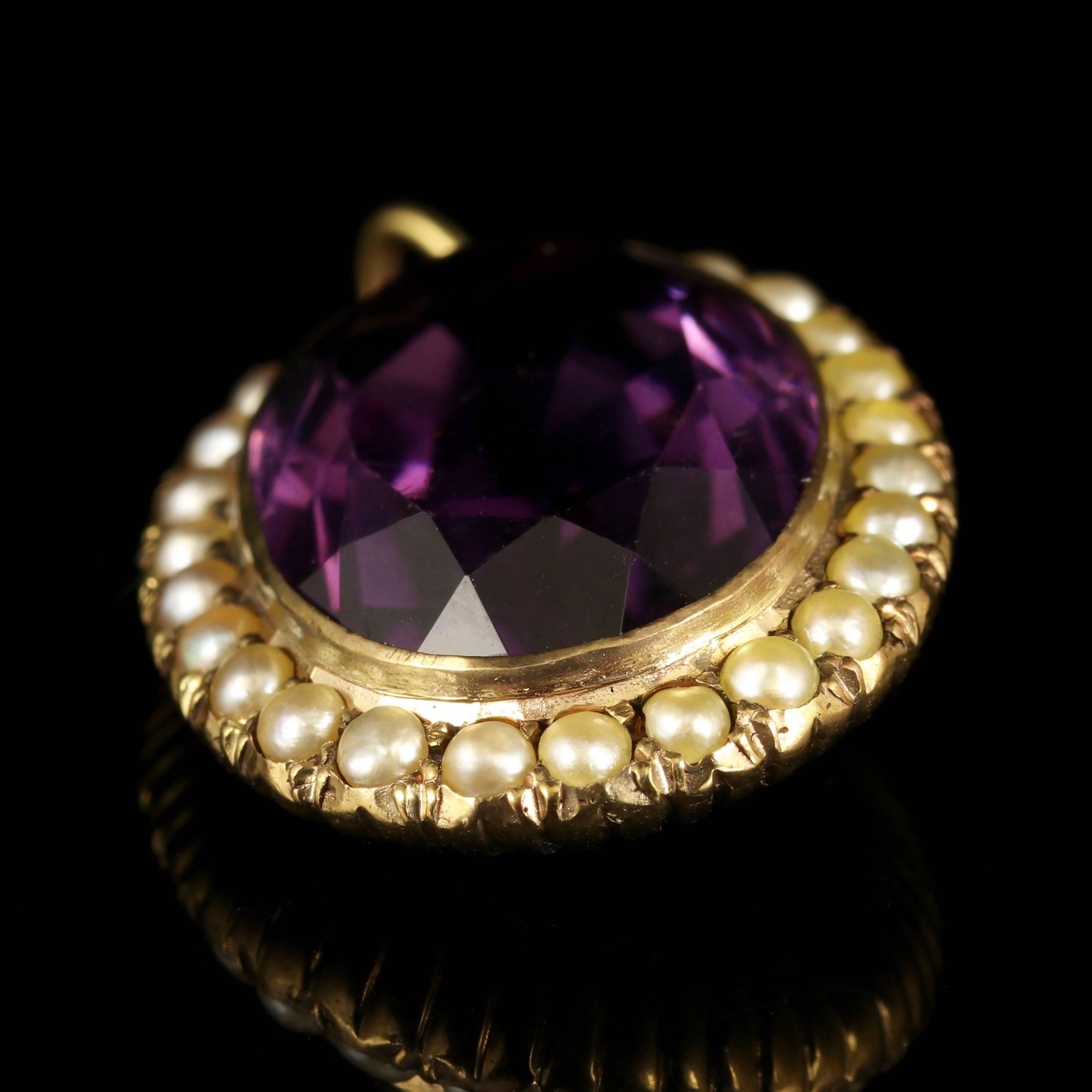 This fabulous antique Victorian pendant is set with a large deep purple Amethyst surrounded by a halo of Pearls.

Amethyst has been highly esteemed throughout the ages for its stunning beauty and legendary powers to stimulate, and soothe, the mind