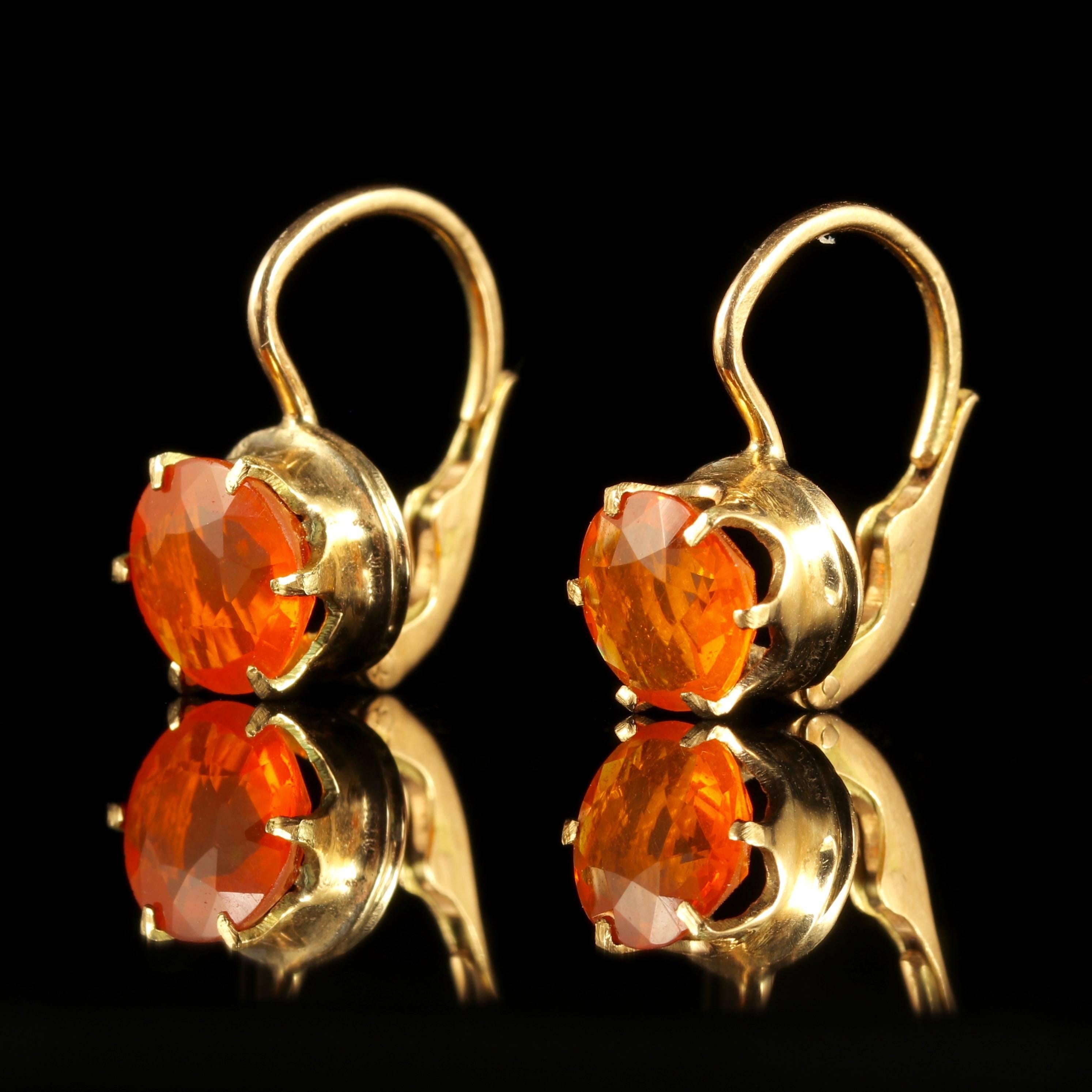 These fabulous Victorian earrings are set in 9ct Rose Gold and set with over 3ct of Fire Opal.

Genuine Victorian earrings, Circa 1900. 

Fire Opals are named for their alluring flaming yellow, orange or red colour that comes from within. 

They are