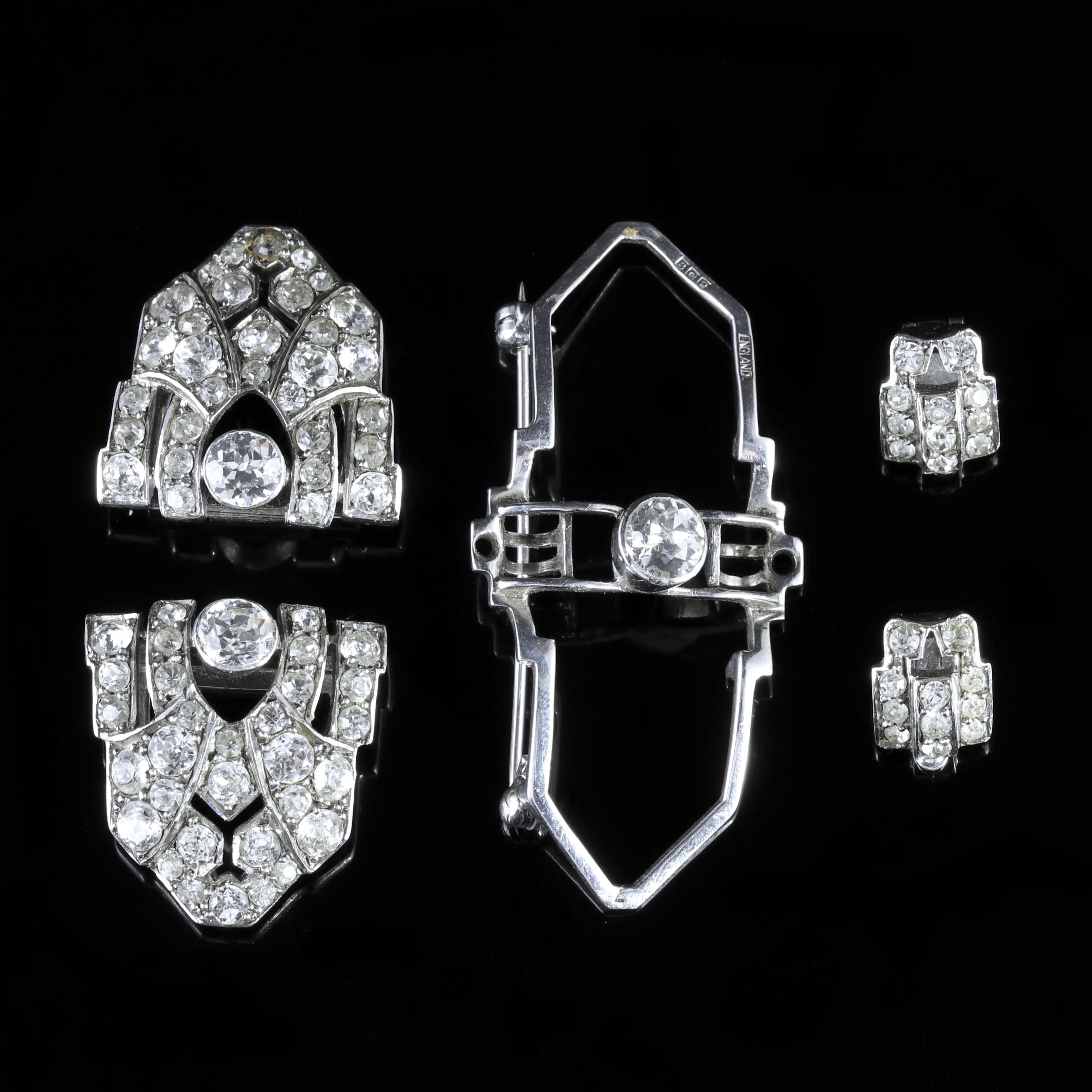 This fabulous antique Art Deco Silver Paste brooch is in a league of its own!

Genuine Art Deco, Circa 1920. 

This beautiful brooch separates into 4 pieces - two small clip on earrings, as well as two sparkling clips that would look fabulous on a