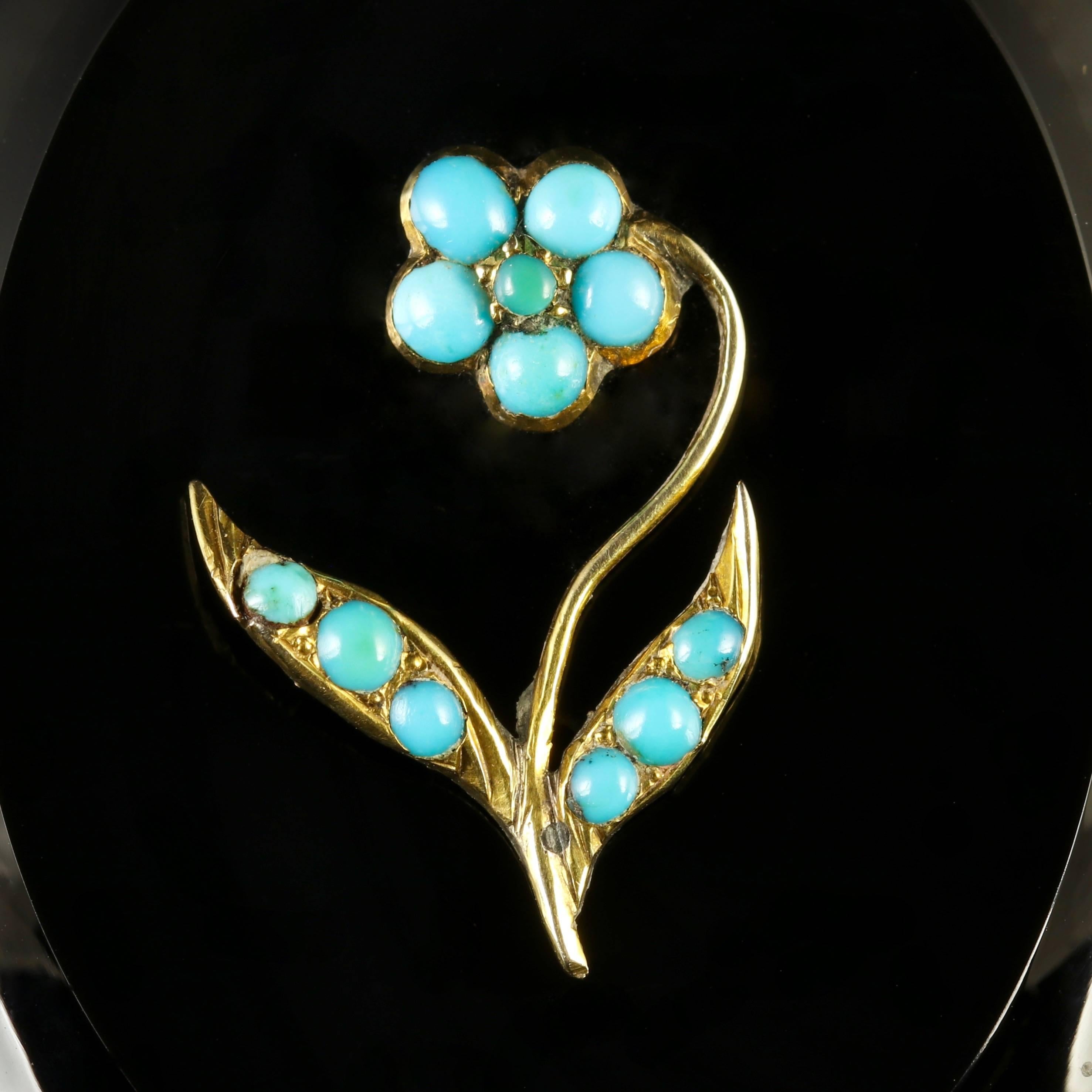 This genuine Victorian French Jet locket is adorned with a forget me not on the front which is adorned with Turquoise’s.

Genuine Victorian, Circa 1850.

French Jet is a type of black glass used to simulate the beauty of Jet. It became popular