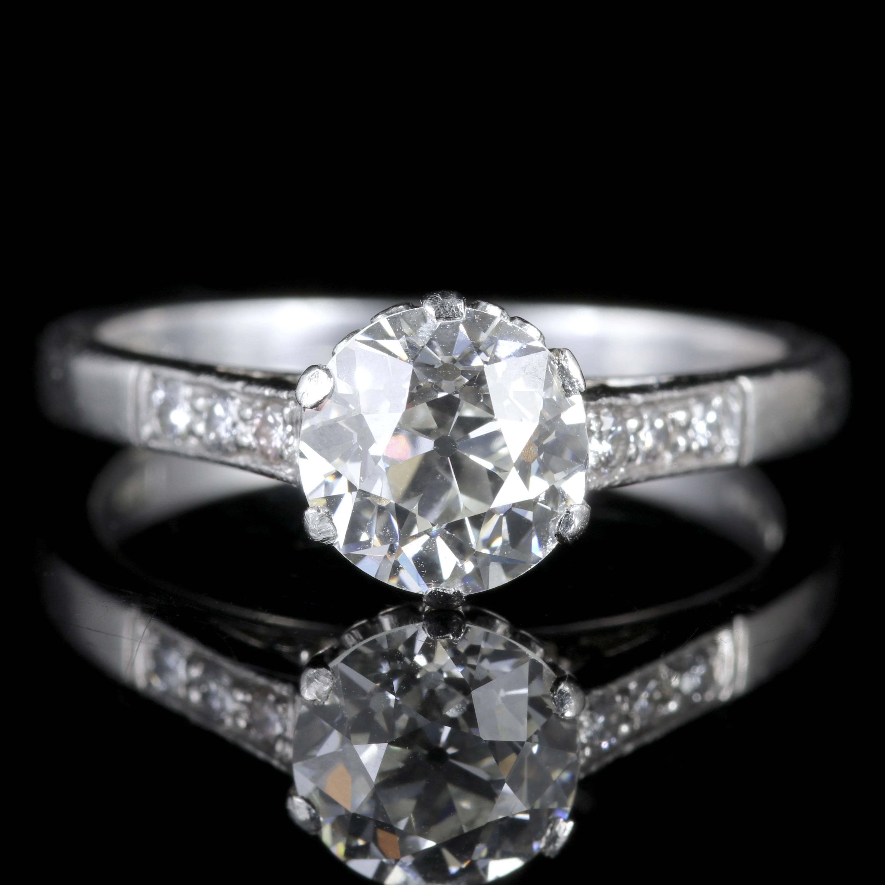 To read more please click continue reading below-

This fabulous all Platinum antique Edwardian Diamond Solitaire ring is Circa 1915.

Set with a beautiful old cut Diamond which is superb clarity - SI 1 H Colour.

Three Diamonds are also set on each