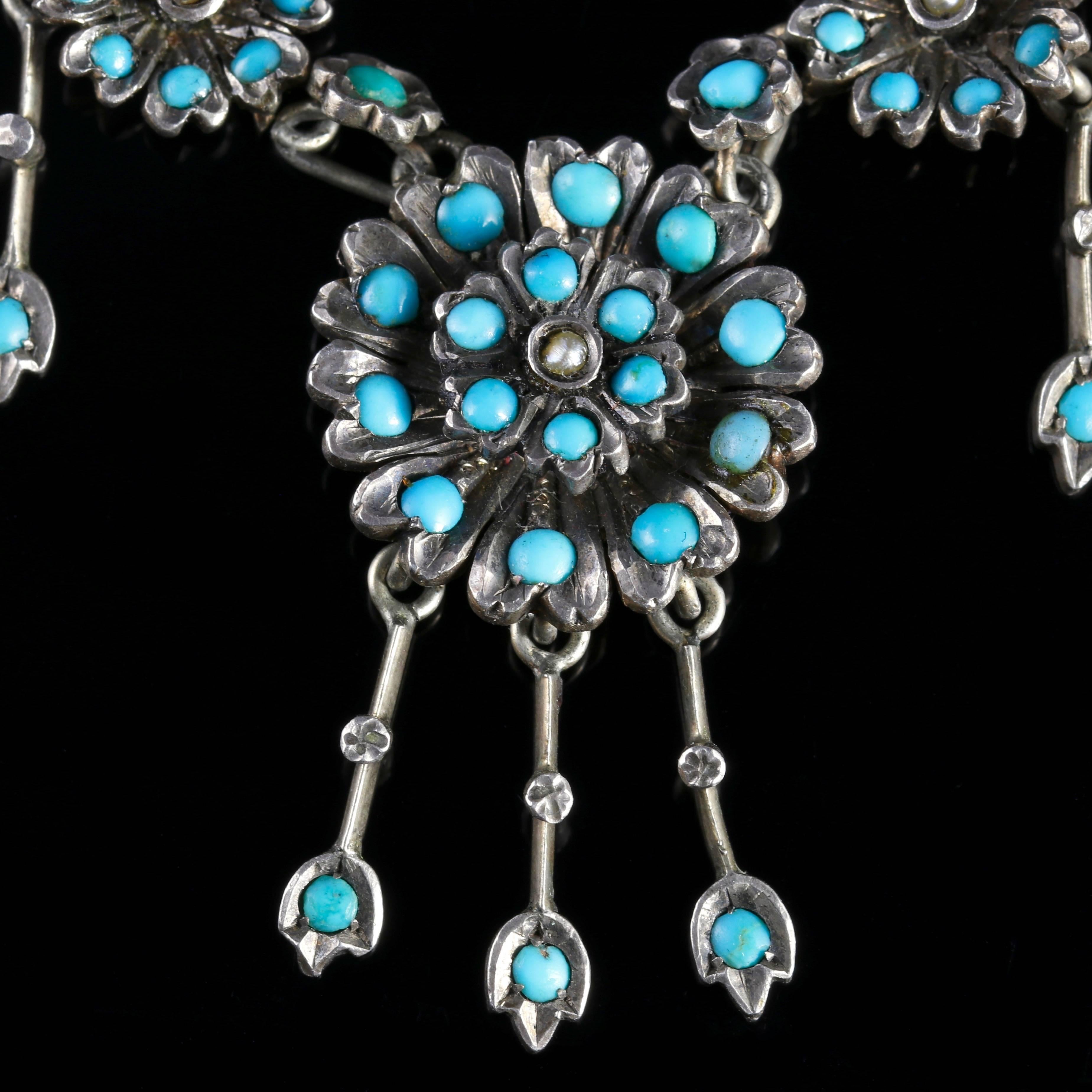 To read more please click continue reading below-

This fabulous antique floral necklace is genuine Victorian, Circa 1880.

The beautiful necklace is adorned with rich blue natural Turquoises which are all original to the necklace.

The Turquoise is