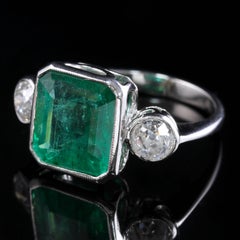 Art Deco Emerald Diamond Platinum Ring 8 Carat Emerald 1.20 Carat Diamond