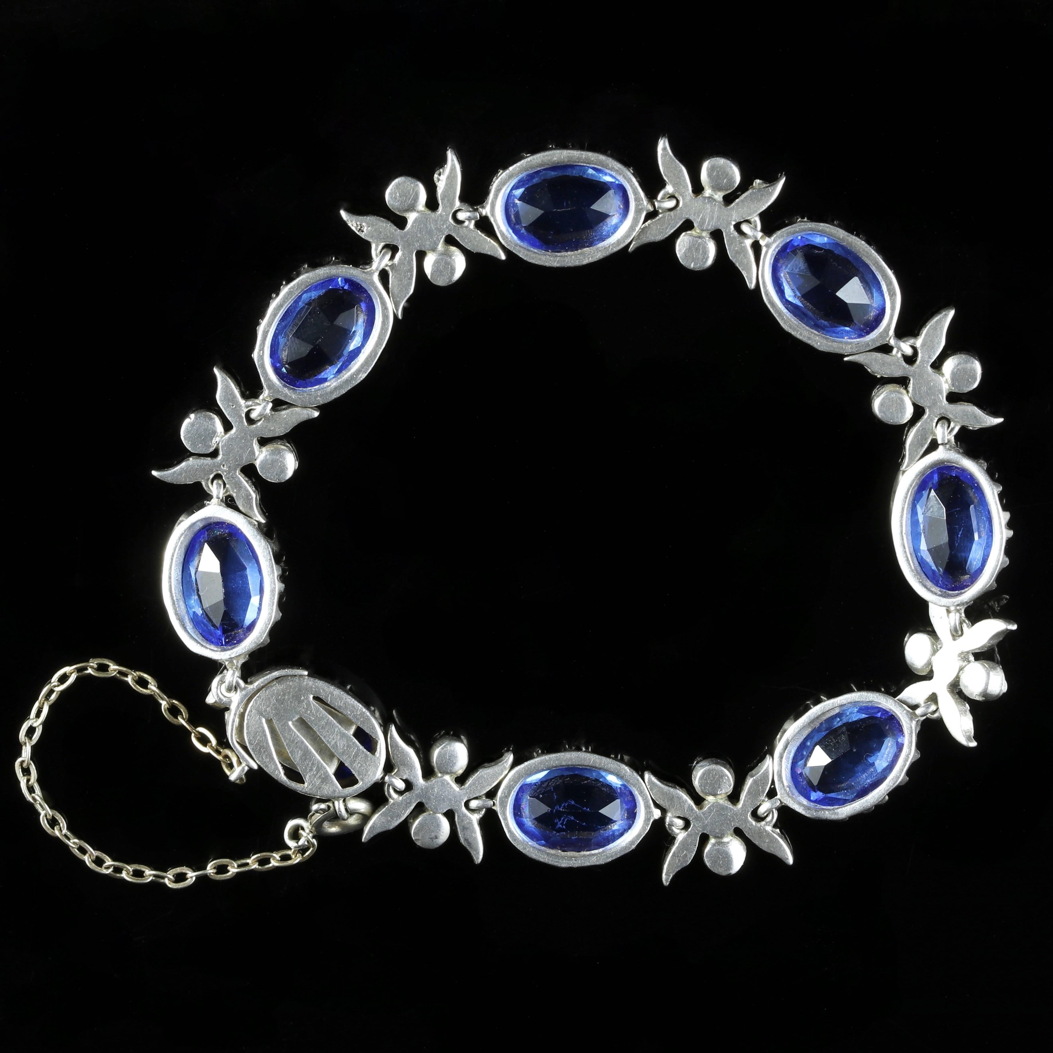 To read more please click continue reading below-

This Sterling Silver Victorian bracelet is set with beautiful Paste Stones, Circa 1900.

Eight fabulous Bristol blue Paste Stones adorn this fabulous bracelet which are complimented by fancy white