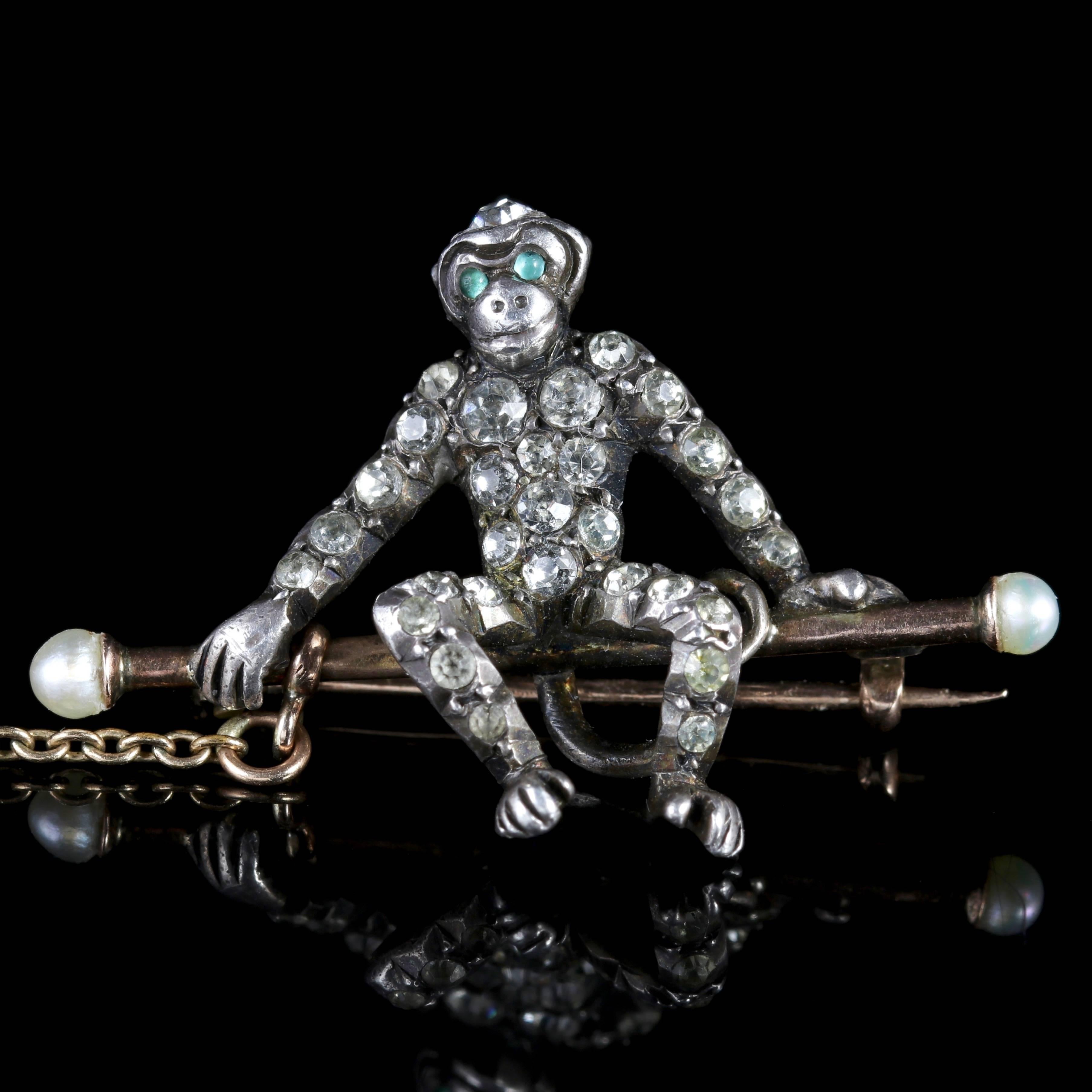 To read more please click continue reading below-

This fabulous 9ct Gold and Silver Edwardian Paste monkey brooch is Circa 1910.

This pleasant brooch depicts two smiling monkeys, one seated on a bar and the other hanging playfully from a chain.