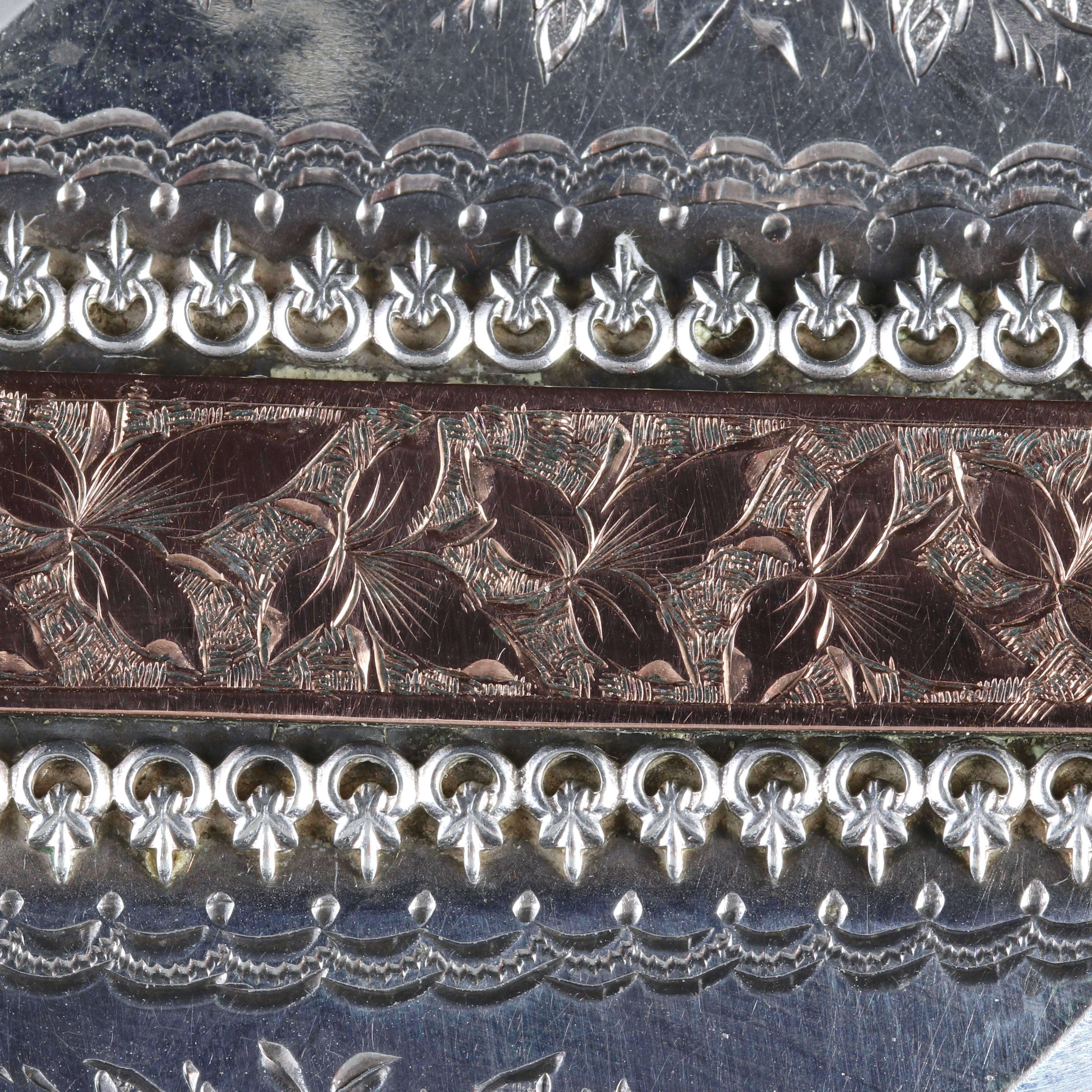 To read more please click continue reading below-

This fabulous Victorian Sterling Silver and Rose Gold locket is dated 1883.

The Locket displays beautiful engraved workmanship with ivy and ornate decoration throughout the diagonal design. 

Ivy