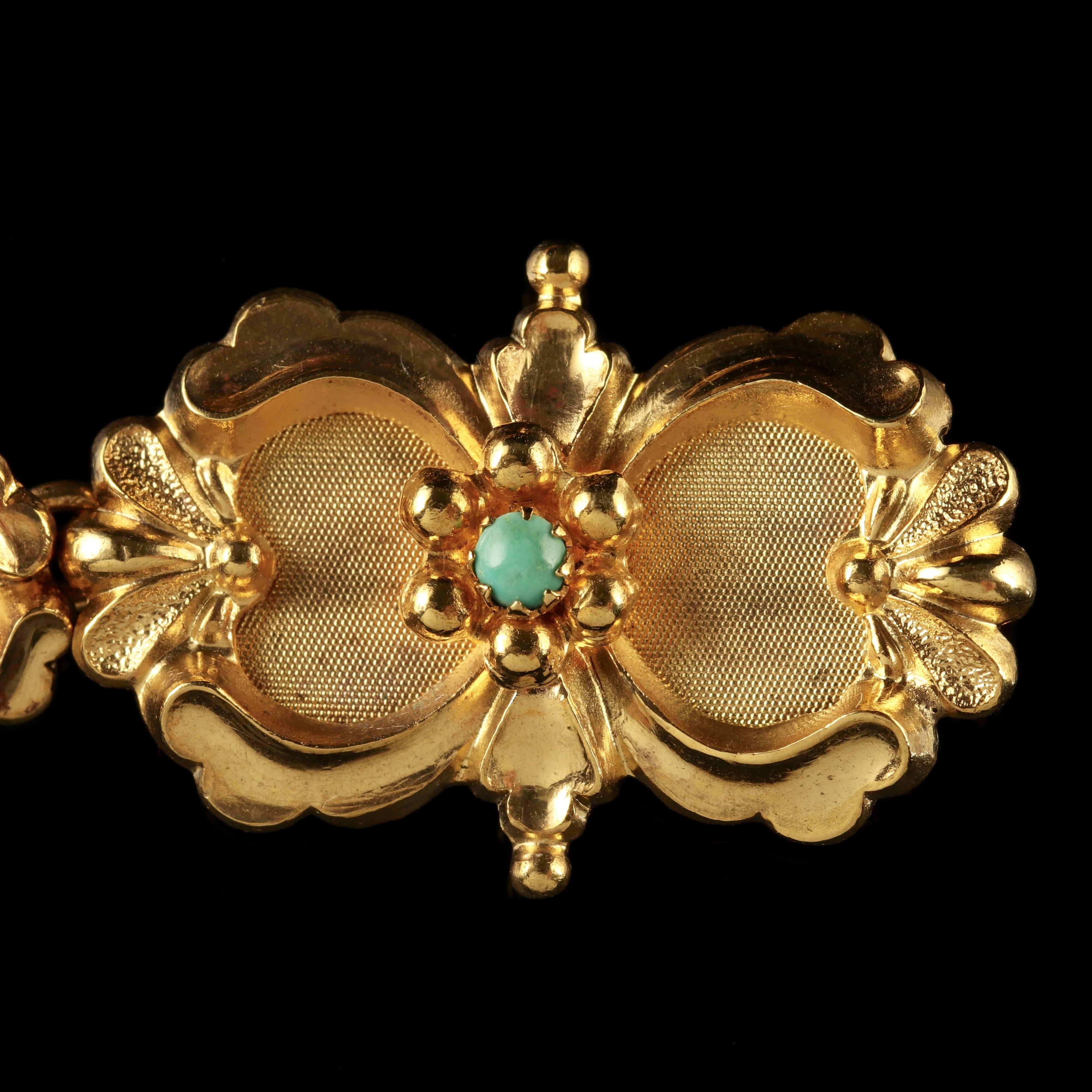 To read more please click continue reading below-

This fabulous antique Turquoise bracelet is set with beautiful Victorian workmanship from the 1880s.

Nine fabulous Turquoise stones adorn each link of this lovely bracelet including the large
