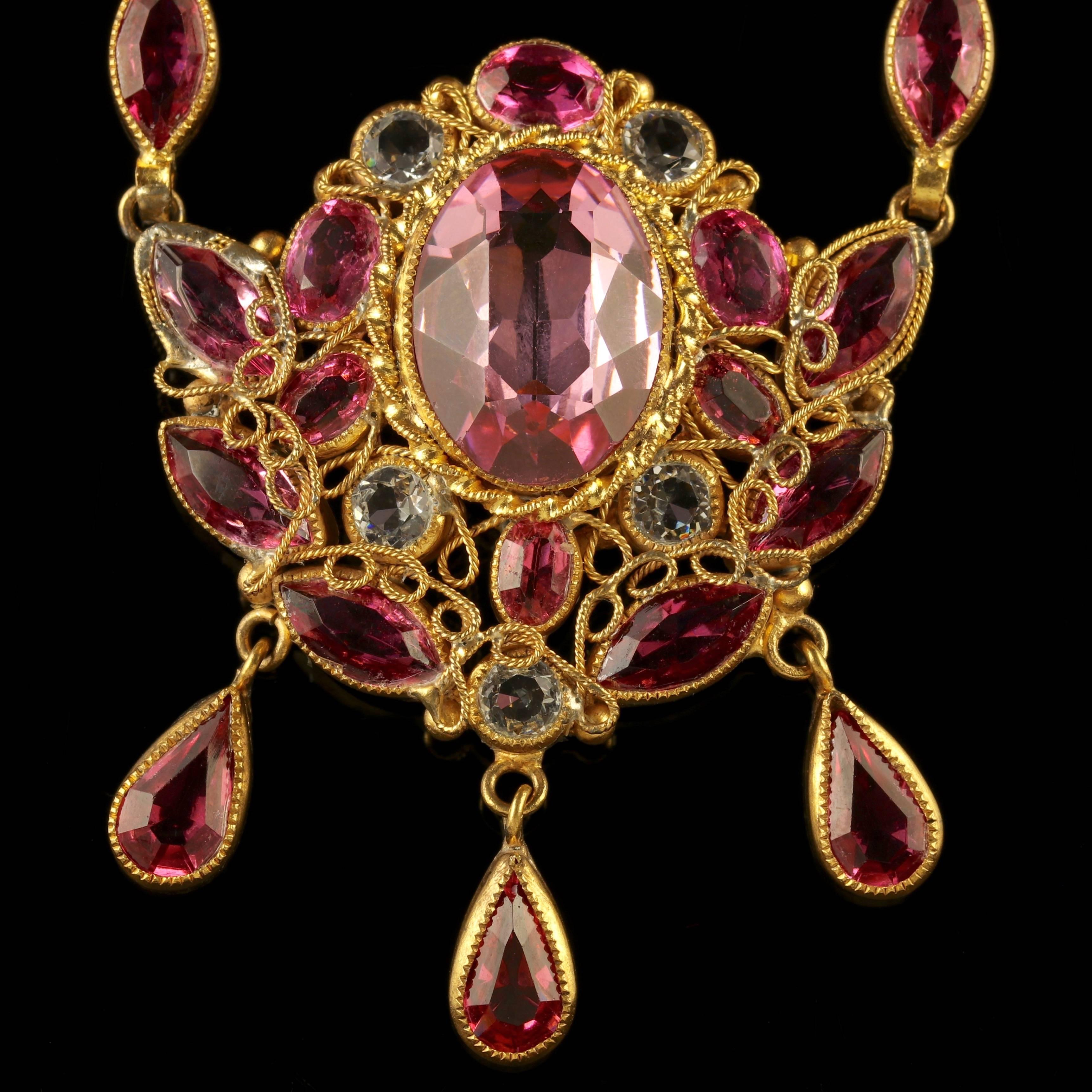 To read more please click continue reading below-

This is outstanding, a beautiful antique Victorian 18ct Gold gilt necklace boasting fabulous Pink and White paste workmanship, Circa 1870.

The Necklace is adorned with the most beautiful rich pink