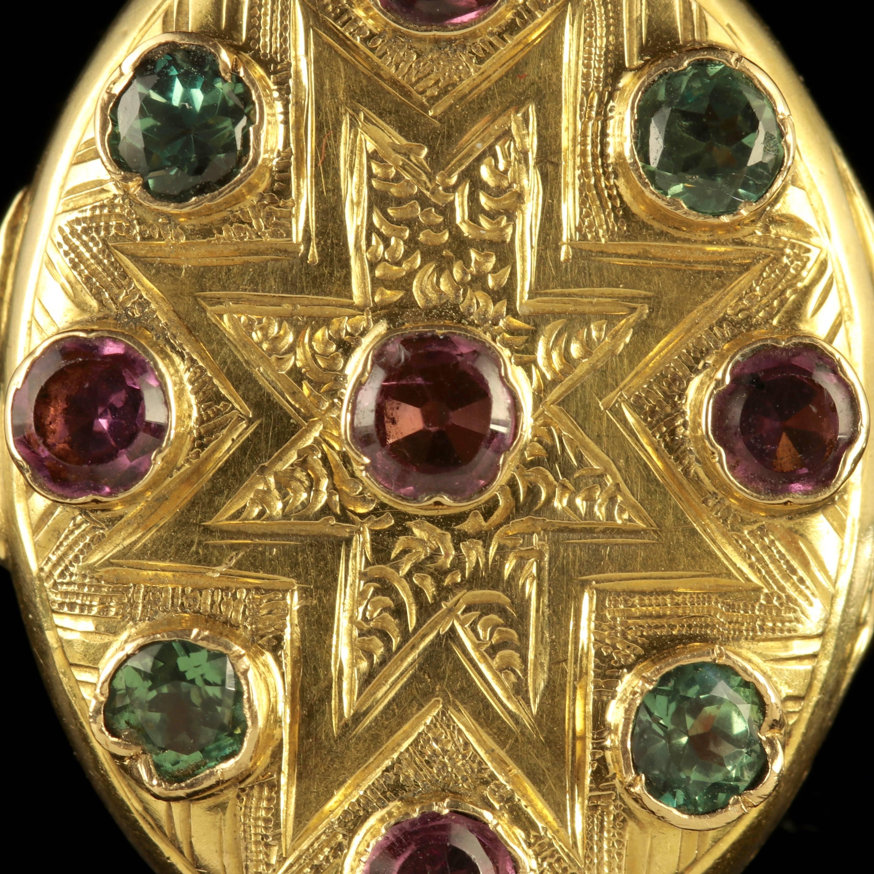 To read more please click continue reading below-

This fabulous antique 18ct Yellow Gold French Victorian locket is set with Tourmalines and Amethyst.

The locket displays a beautifully engraved front and back, set with the most breath taking