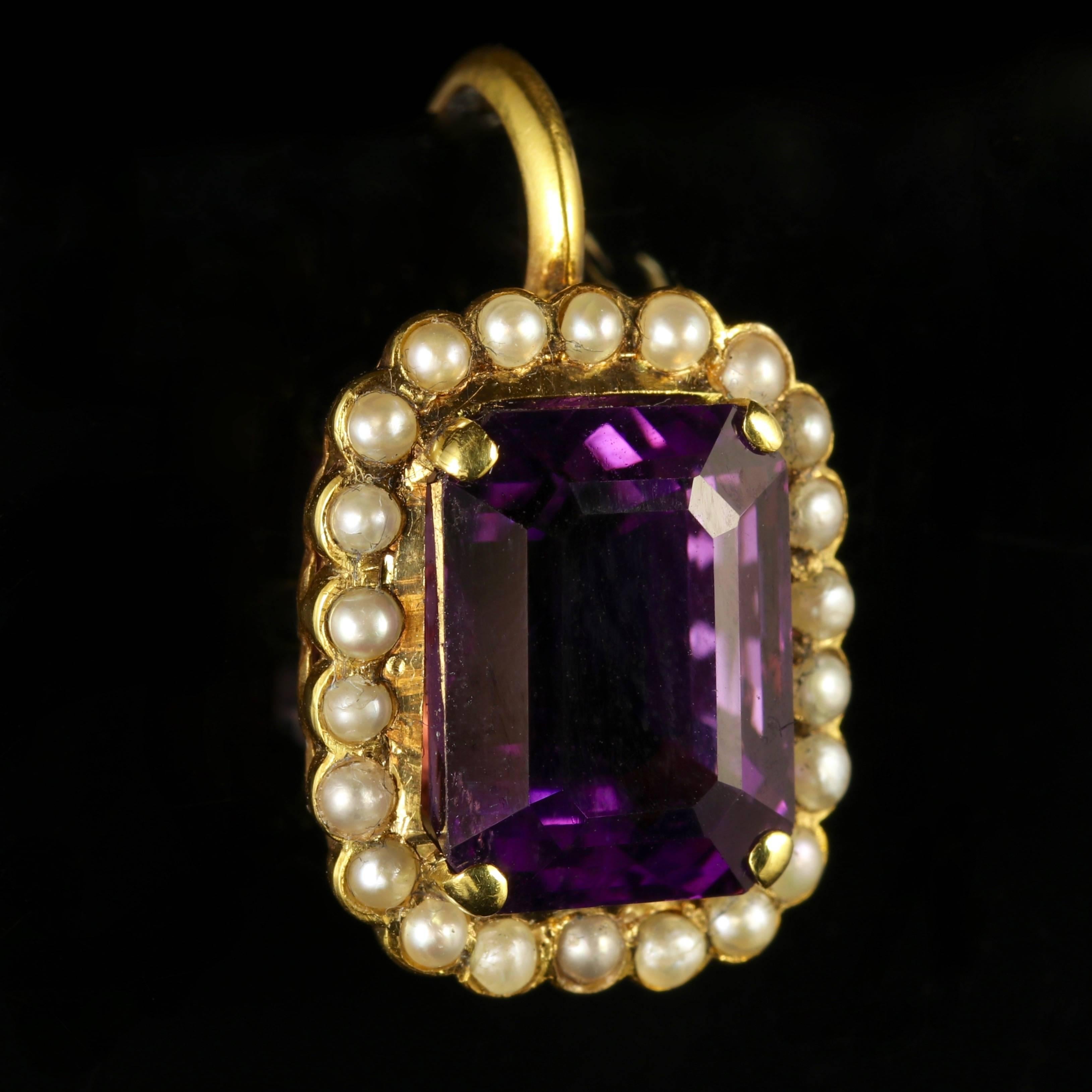 To read more please click continue reading below-

These fabulous Antique 18ct Yellow Gold Amethyst earrings are genuine Victorian, Circa 1900.

Each emerald cut Amethyst boasts a lovely deep velvet hue surrounded by a halo of lovely