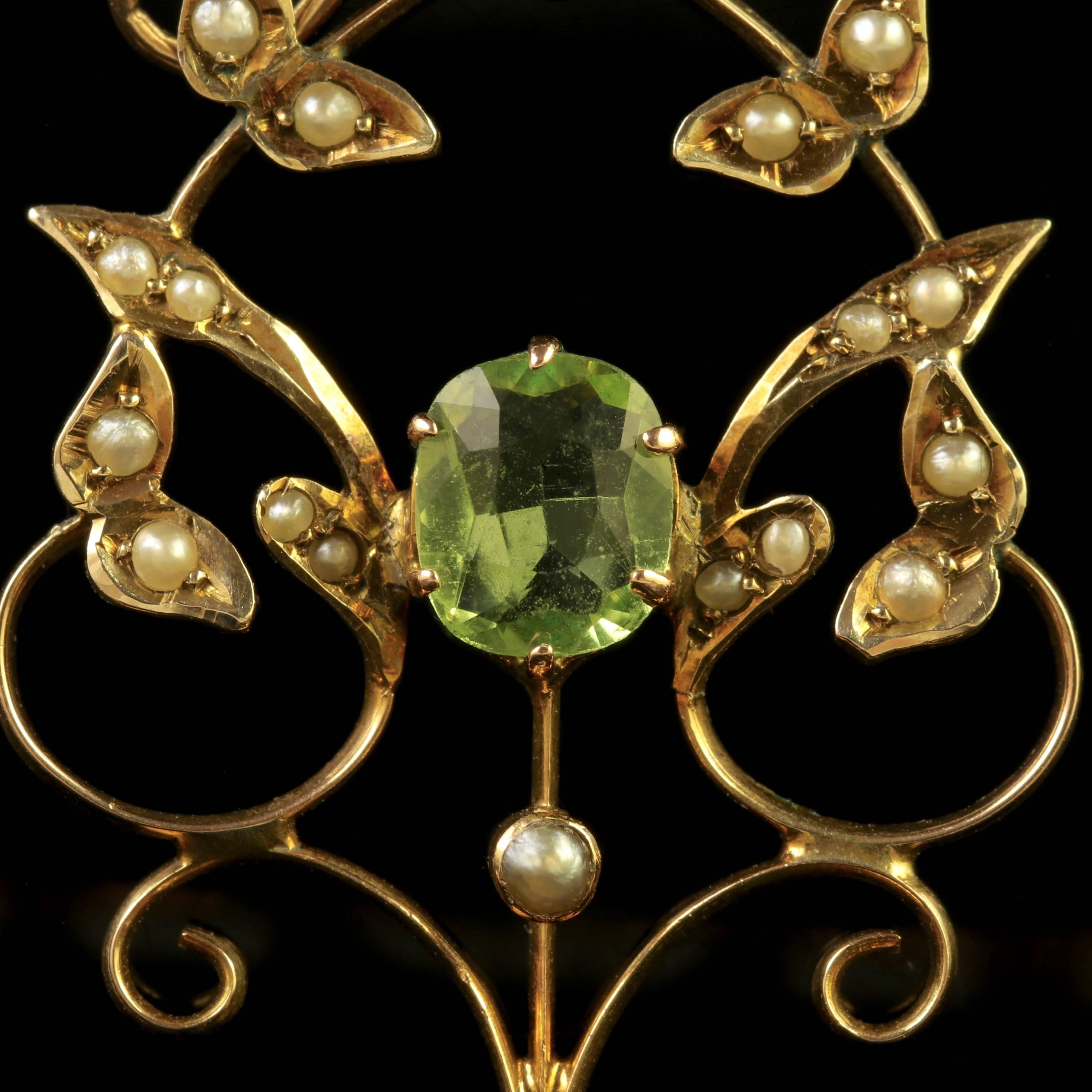 To read more please click continue reading below-

This beautiful antique 9ct Yellow Gold Peridot pendant is genuine Victorian, Circa 1900.

The lovely pendant is adorned with two rich green Peridots and decorated with fabulous Pearls.

The larger