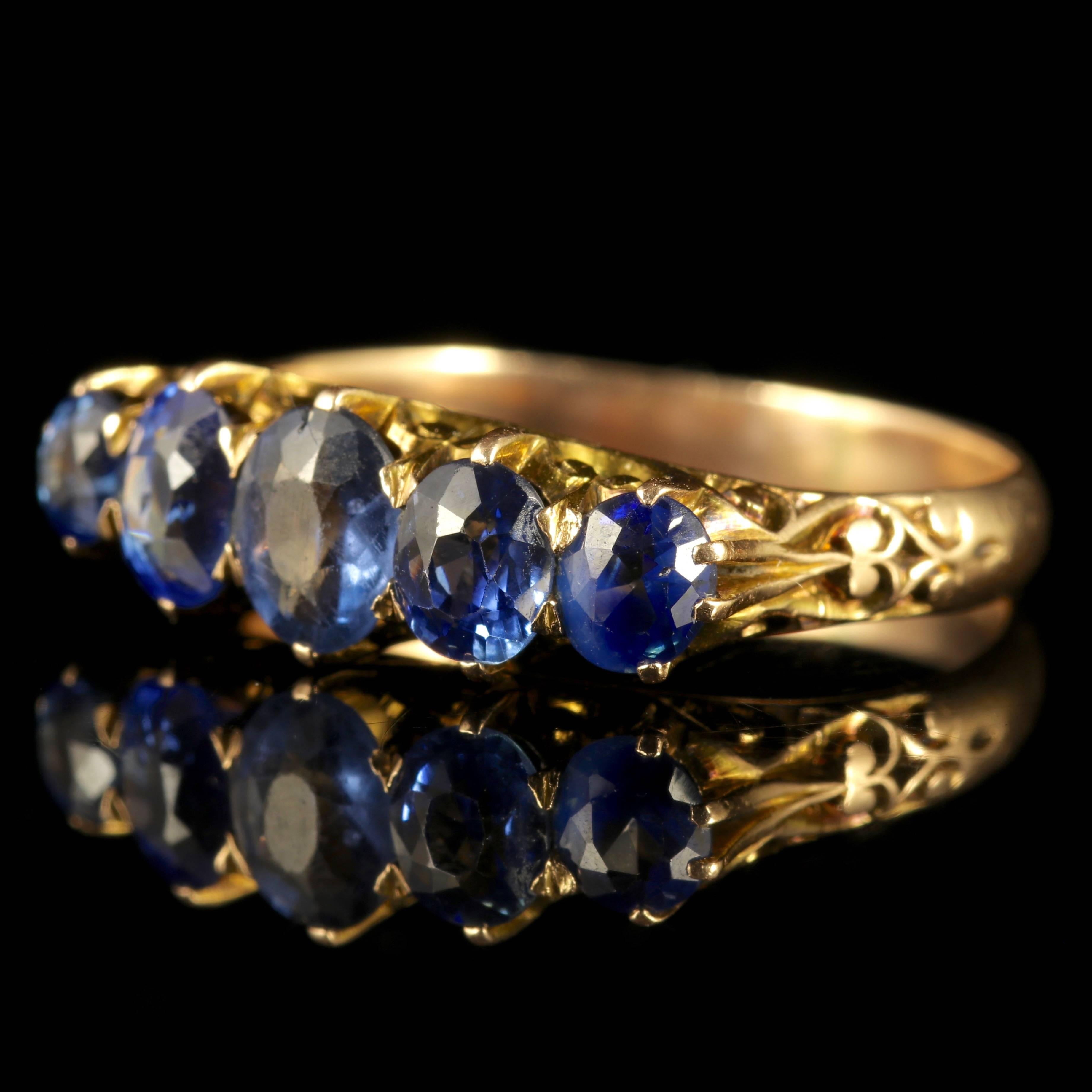 To read more please click continue reading below-

This fabulous Antique Victorian ring boasts five spectacular natural Sapphires which are set in a 18ct Yellow Gold gallery.

The central deep blue Sapphire is 0.75ct, graduating down to a total of