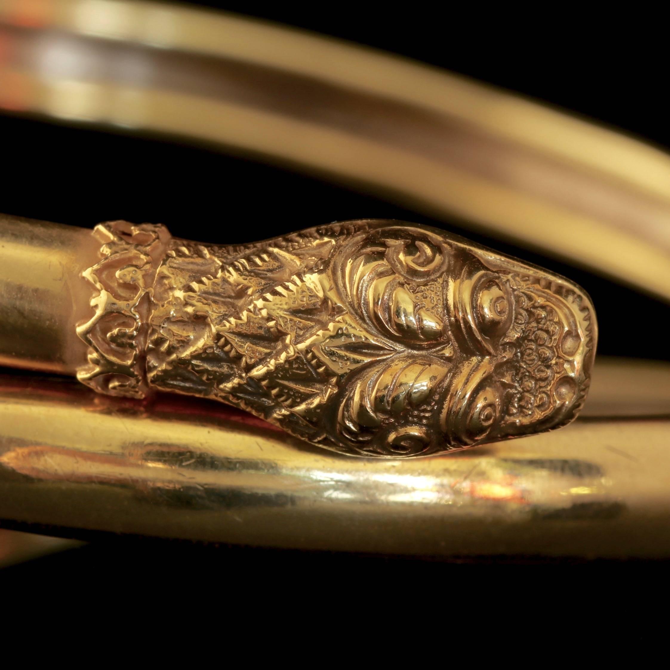 To read more please click continue reading below-

This unique antique Victorian gilded 18ct Gold on Sterling Silver Serpent bangle is Circa 1880. 

Serpent jewellery became popular during the early years of Queen Victoria’s reign coinciding with