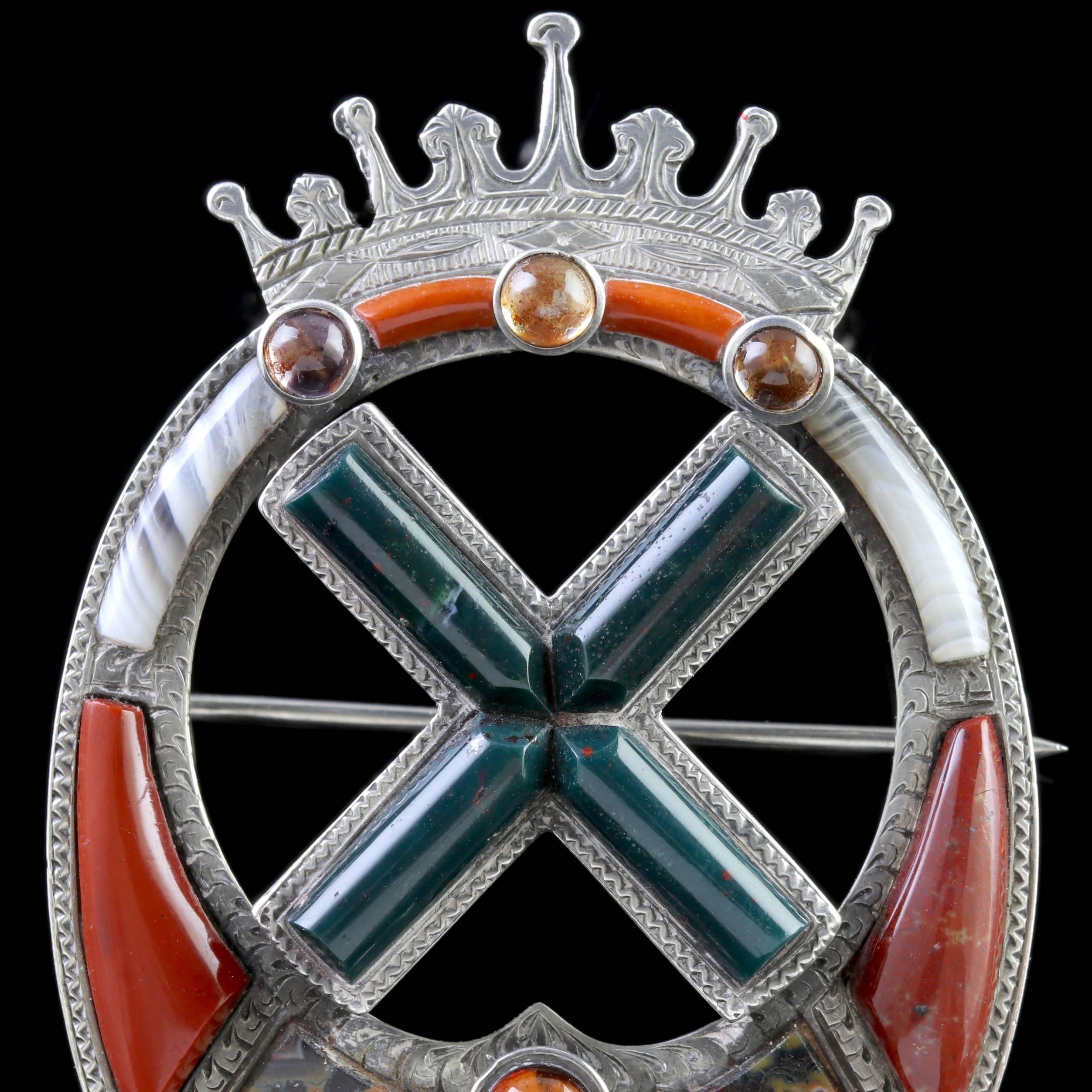 To read more please click continue reading below-

This fabulous Antique Victorian Sterling Silver Scottish Celtic brooch is fully hallmarked April 1874.

A lovely engraved crown adorns this fabulous Celtic brooch with a large Agate cross in the