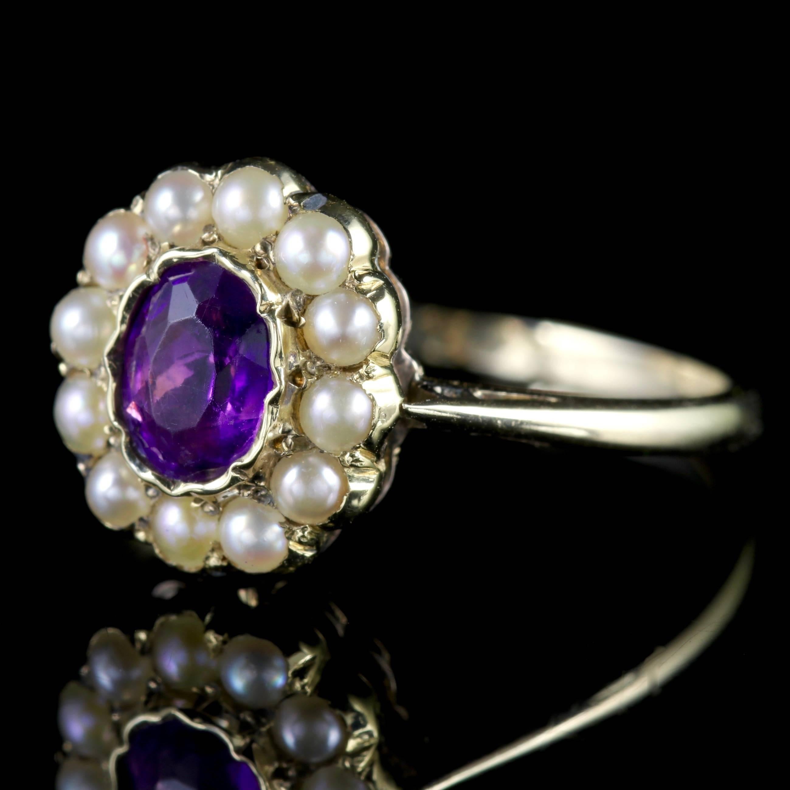 To read more please click continue reading below-

This fabulous antique 18ct Yellow Gold Amethyst and Pearl cluster ring is genuine Victorian, Circa 1900.

A beautiful deep Violet Amethyst sits in the centre of the piece surrounded by a halo of