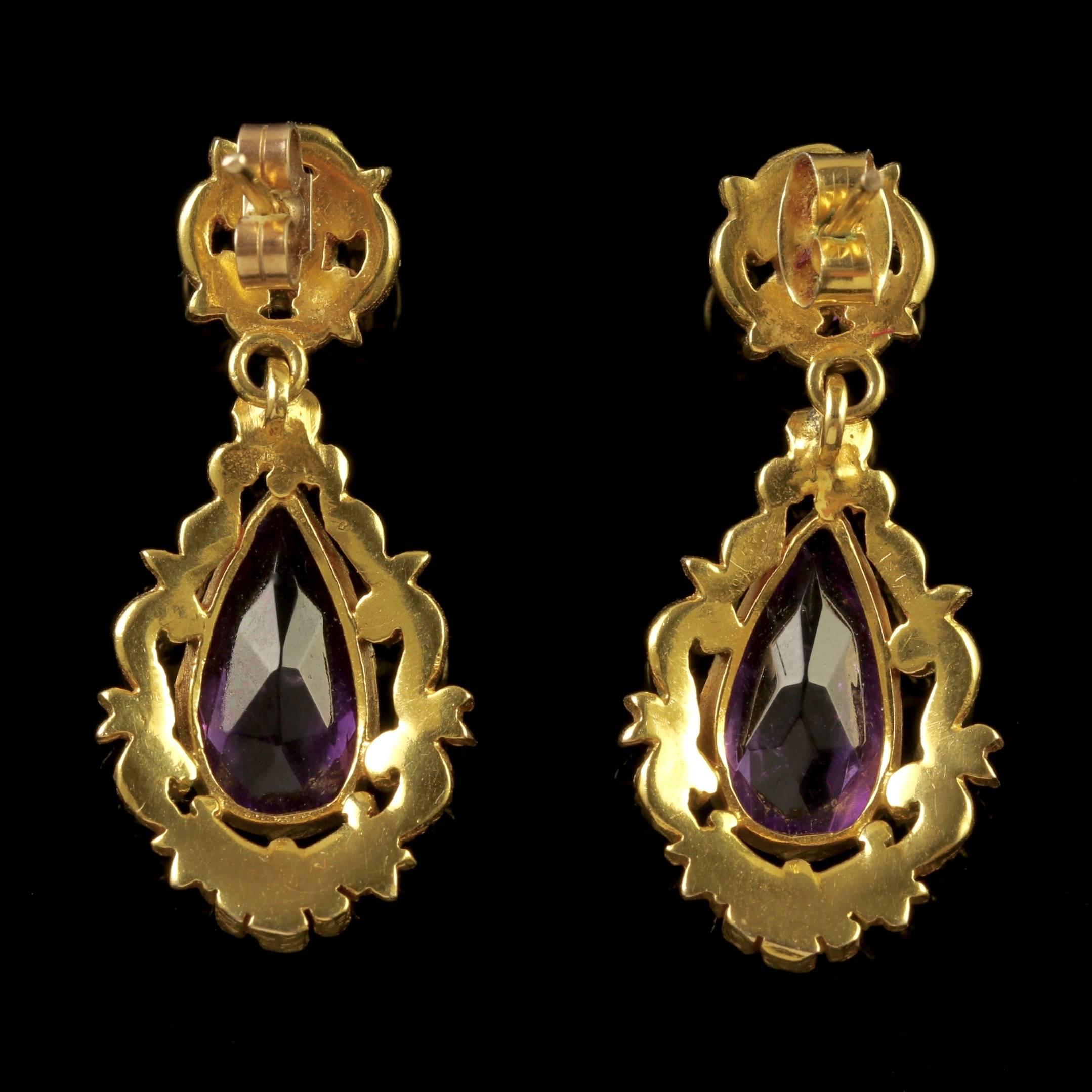 To read more please click continue reading below-

These fabulous antique Victorian 18ct Gold drop earrings are adorned with natural deep purple Amethyst stones.

Each Amethyst is over 4ct in size with a smaller Amethyst set in the top