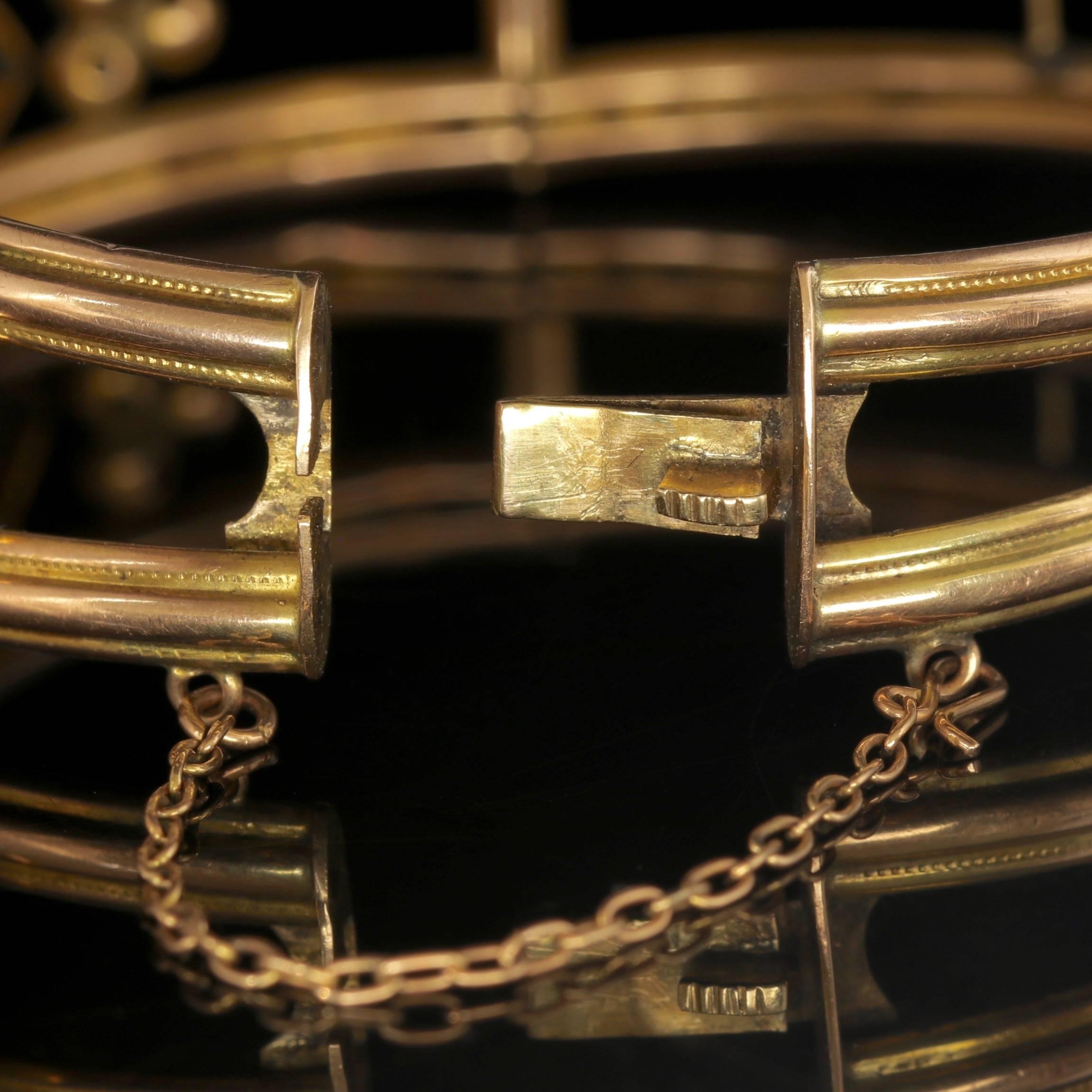 Women's Antique Victorian 9 Carat Gold Star Set Ruby Diamond Bangle, circa 1900