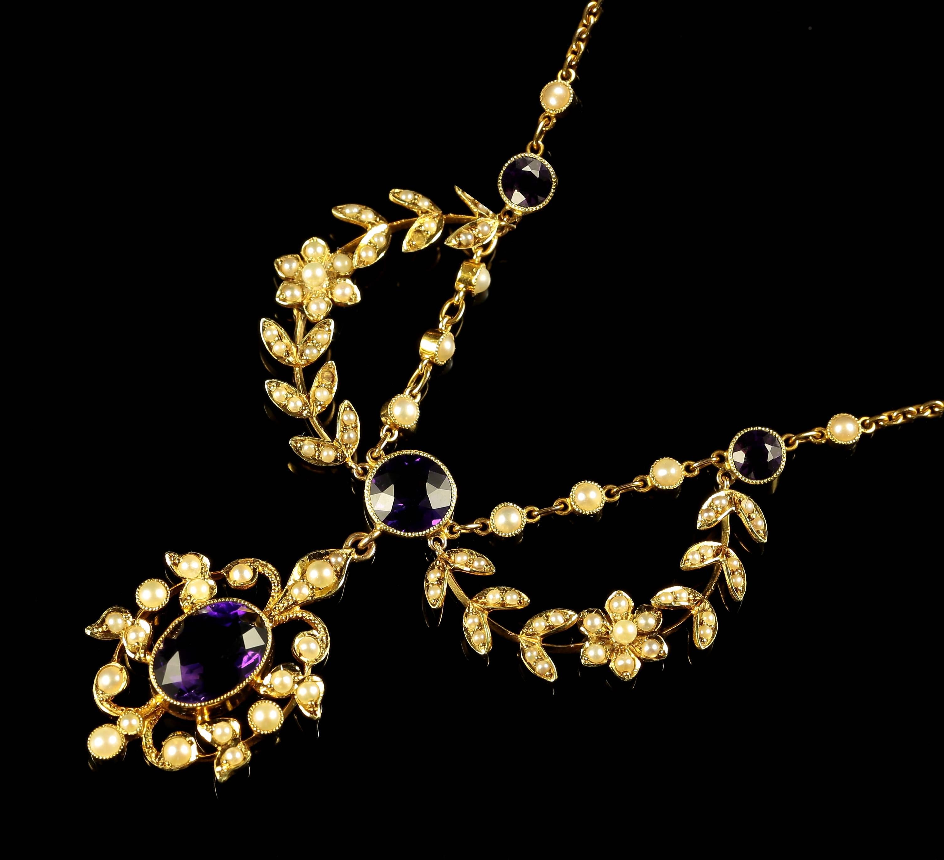 This fabulous 15ct yellow gold Victorian necklace is adorned with rich velvet Amethysts and lustrous Pearls.

Circa 1880 this really is beautiful, ideal for a wedding.

The central rich purple amethyst is 3.70ct the top amethyst measures 1.60ct

The