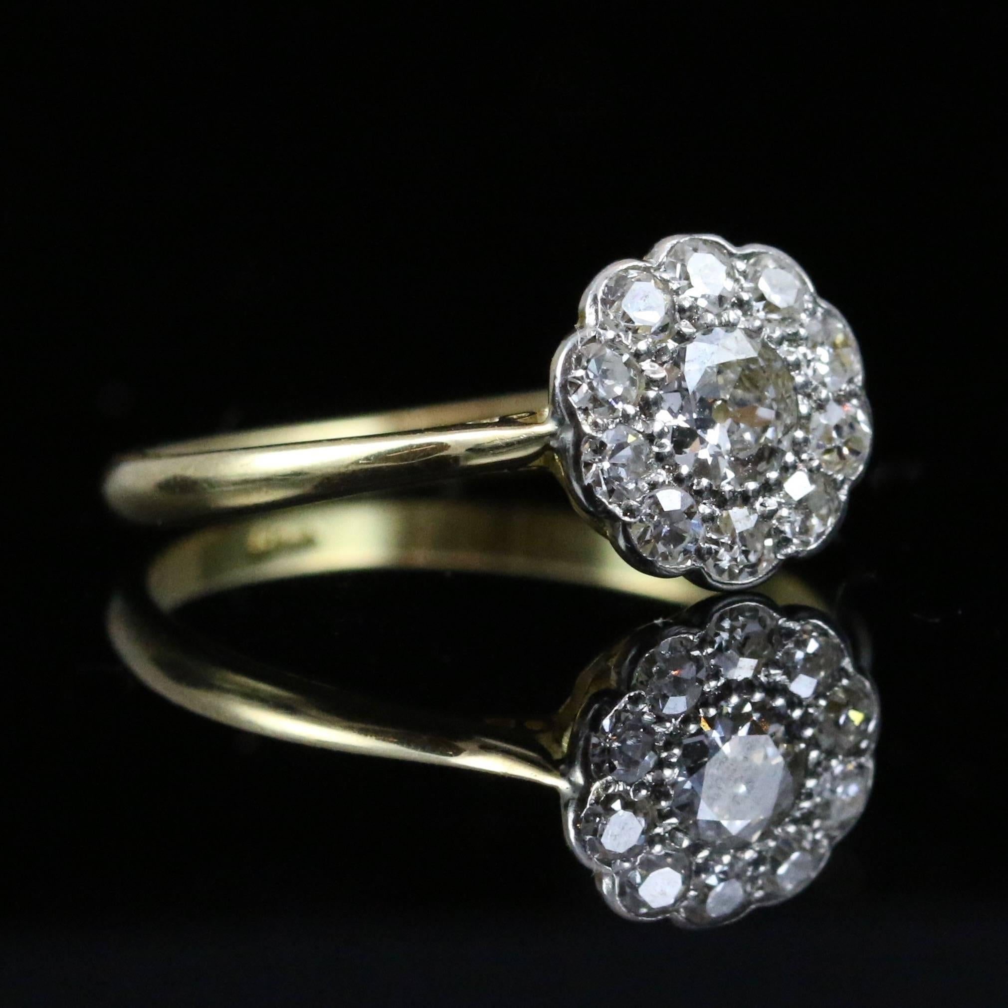 This beautiful Antique Victorian 18ct yellow gold white gold cluster ring boasts stunning Old Cut Diamonds approx. 1ct in total. 

The Diamonds are original to the ring which is Circa 1900's 

The centre Diamond is 0.45ct with smaller Diamonds