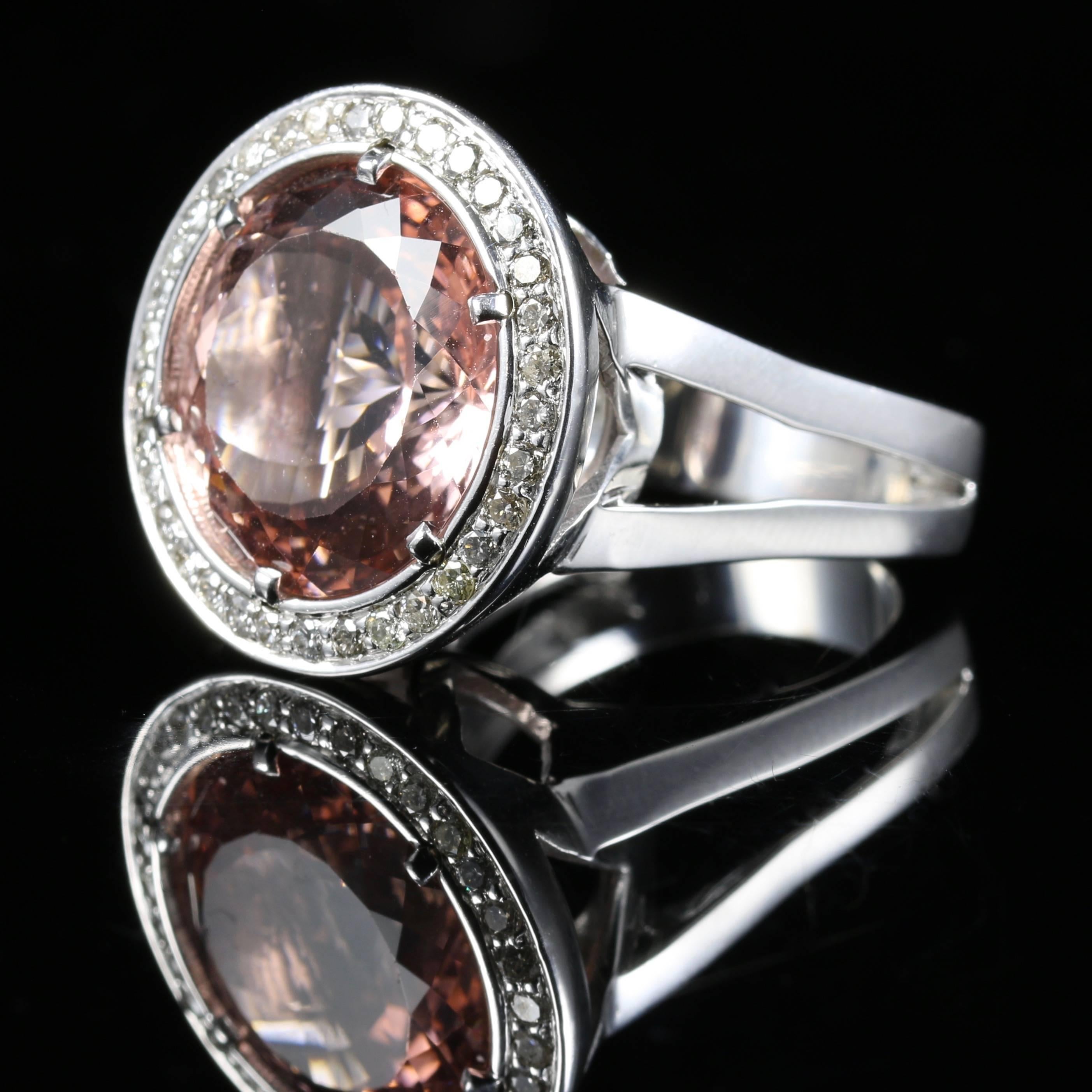This stunning Morganite Diamond ring is one of the largest most fabulous Morganite rings we have ever seen, with over 25ct of Morganite.

Morganite, also known as Pink Beryl, Rose Beryl, Pink Emerald, and Cesian Beryl, is a rare light pink to