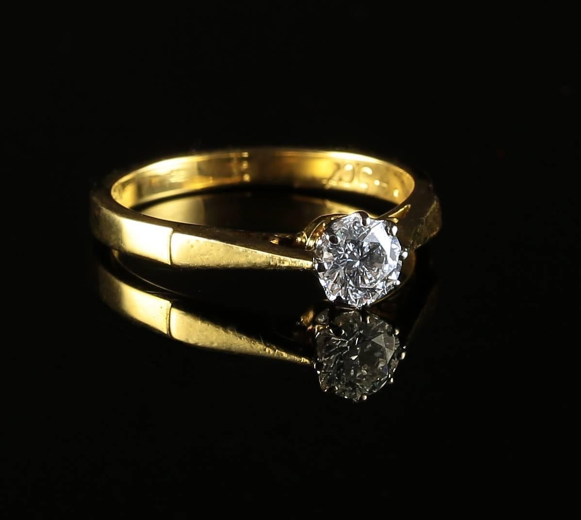 This beautiful 18ct yellow gold ring is set with a 0.45ct Old Cut Diamond 
Circa 1900

The Diamond is beautiful, full of sparkle VS 1 H Colour.
The Diamond weight is stamped inside the shank 0.45ct and the old 18ct stamp too.

The diamond sparkles