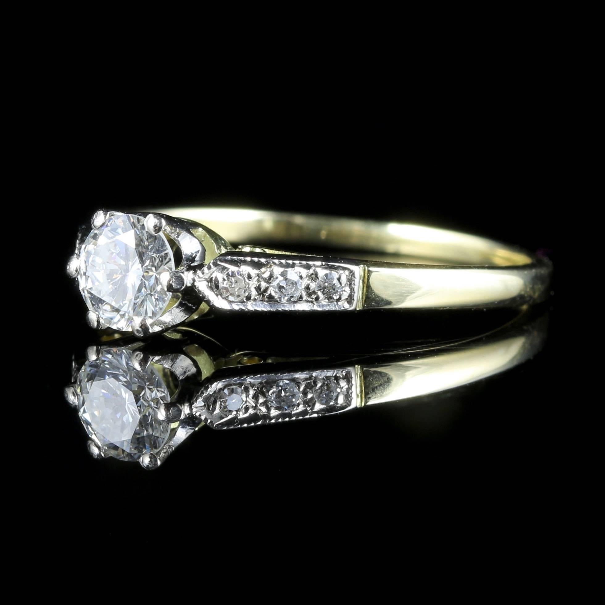 This beautiful Antique Edwardian ring is Circa 1915 and is set with a 0.60ct solitaire and old brilliant cut Diamonds down each shoulder which are another 0.12ct 

The Diamond weight is 0.72ct in total.

The lovely bright white central Diamond is SI