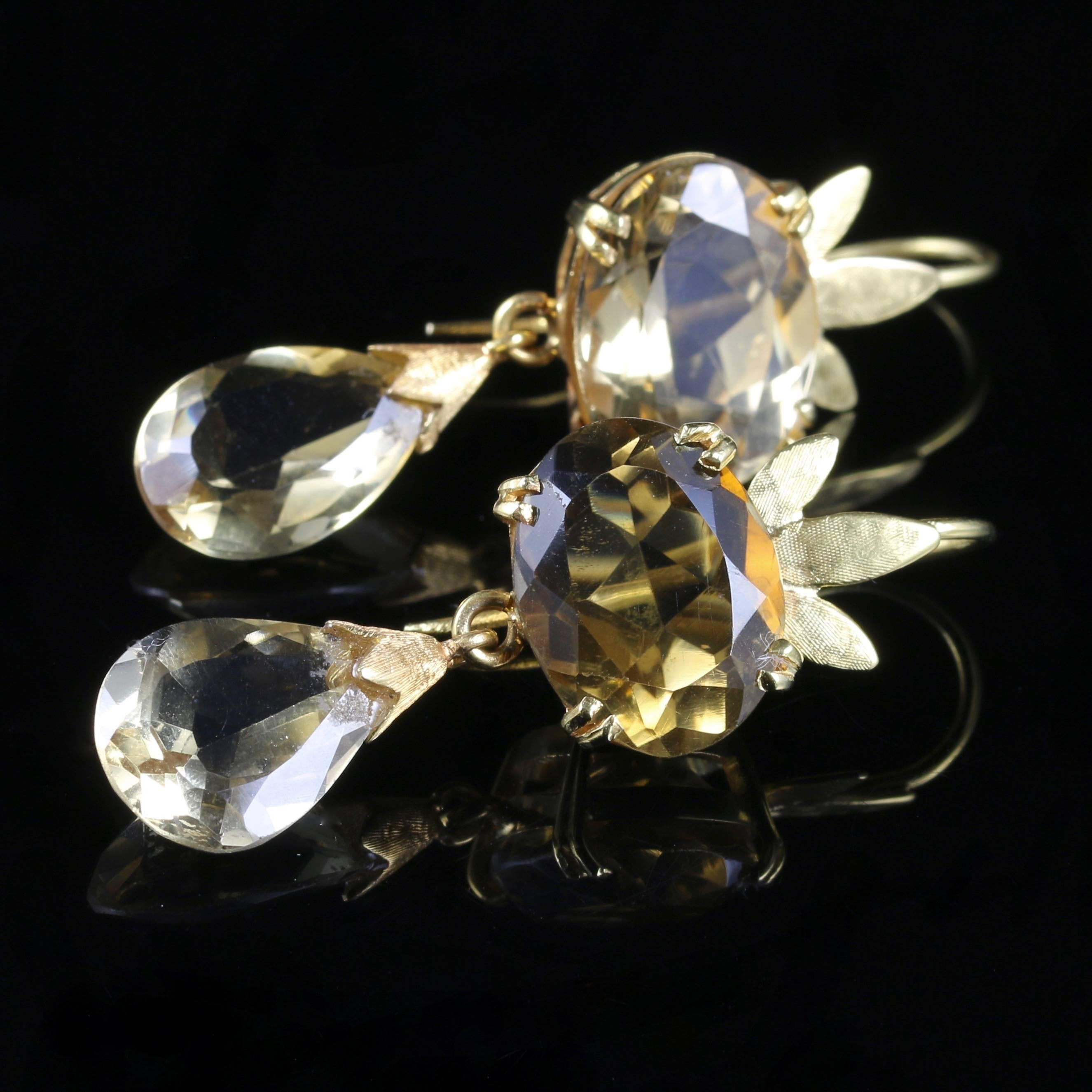 These very beautiful Victorian earrings are Scottish depicting the Scottish thistle and set with fabulous Citrines. 

The earrings are set in 18ct solid Yellow Gold. 

Circa 1900 

The top Citrine is 8ct each leading to a bottom citrine pendant