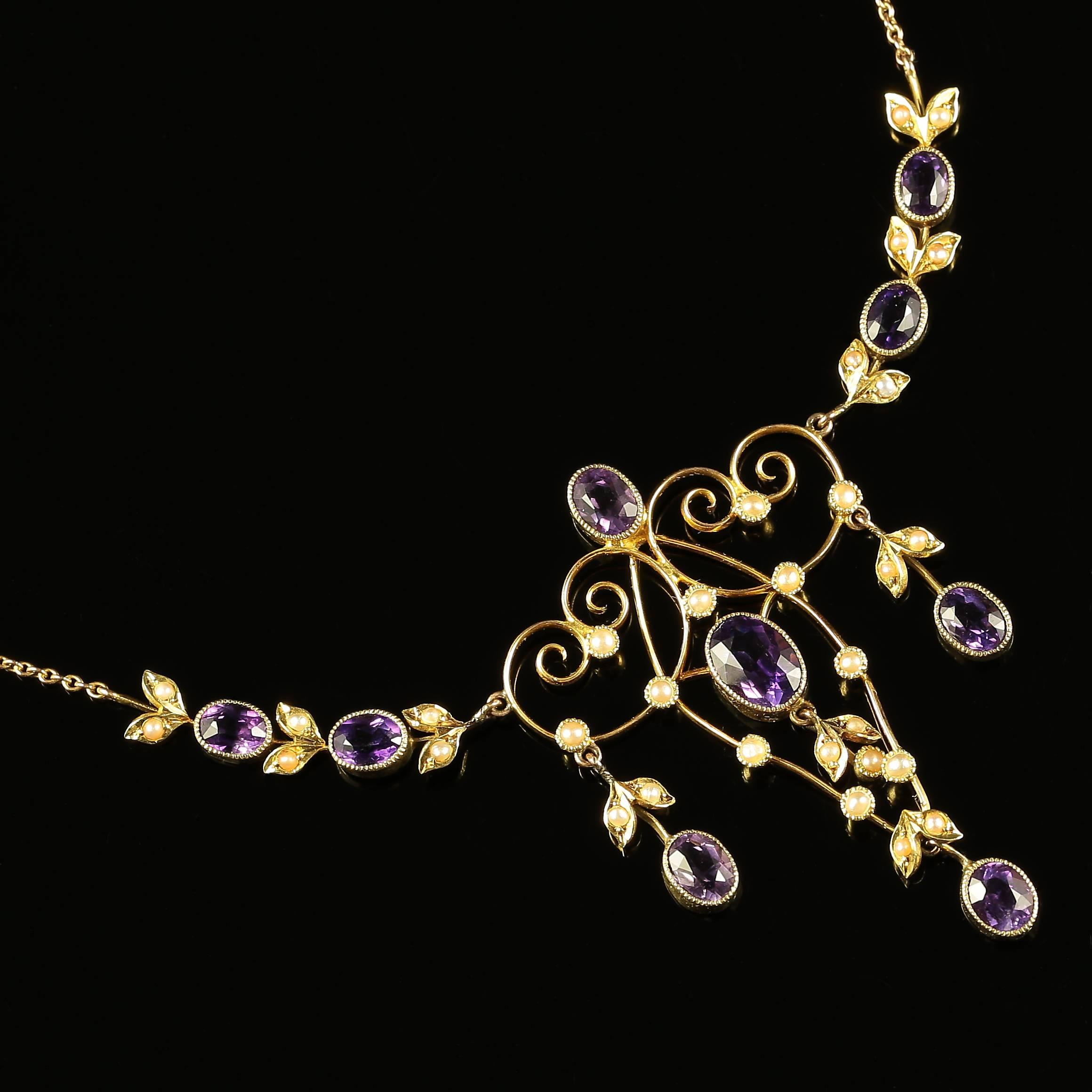 This beautiful genuine Edwardian Antique 9ct yellow gold necklace is steeped in English history. 

Adorned with beautiful rich Velvet Amethyst and rich lustrous pearls. 

This is all Edwardian not a reproduction. 

The Purple Amethyst has been