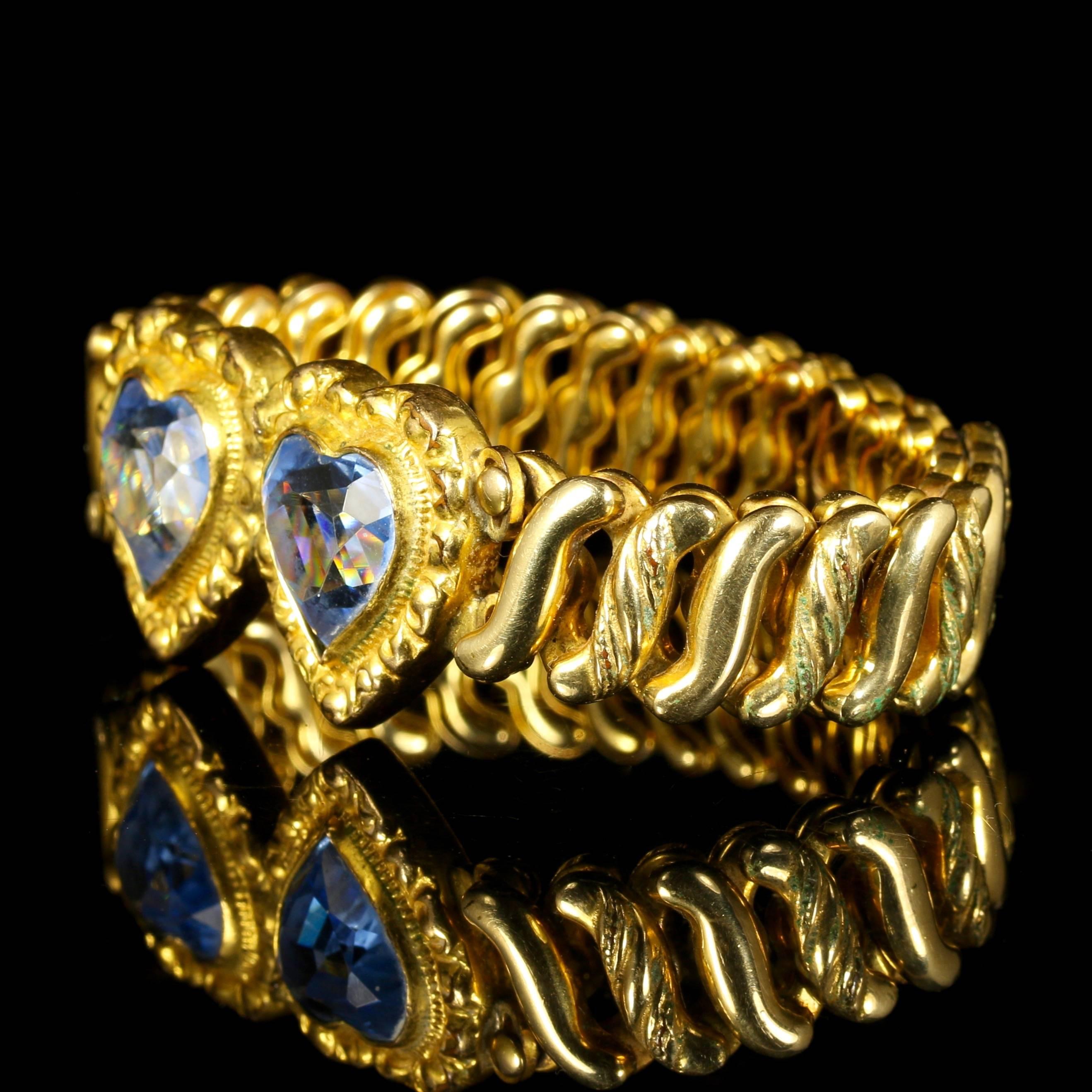 This fabulous Victorian 18ct rolled gold bracelet is expandable so will fit most size wrists.

Two beautiful large blue paste hearts are set in a lovely ornate gallery.

Beautiful engraving around every alternative link on the bracelet.

Paste is a