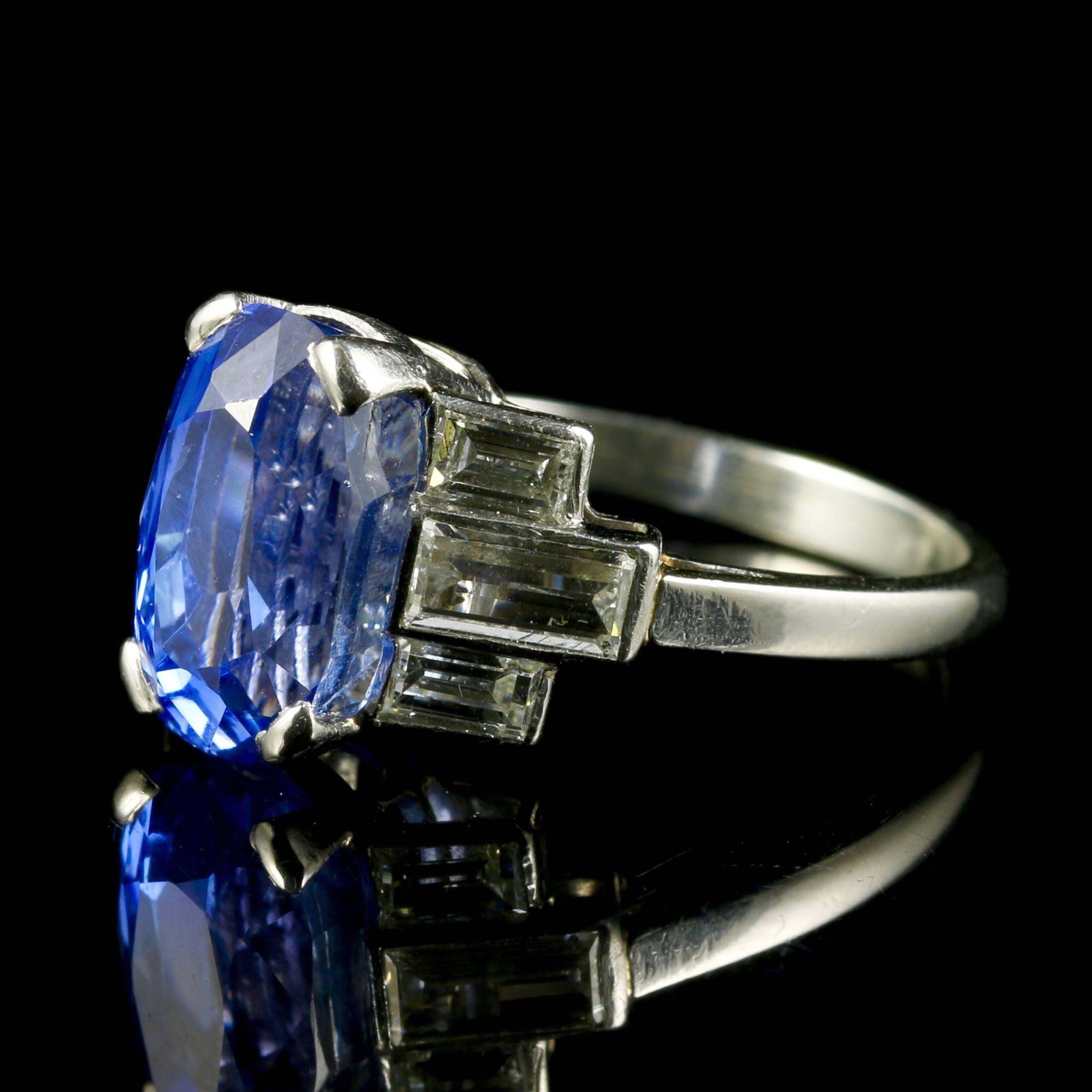 This is a genuine Art Deco all platinum sapphire and diamond ring, which is Circa 1920.

The ring is stunning set with a 3.80ct sapphire in the centre which is surrounded by magnificent baguette cut diamonds.

The baguette cut diamonds are VS1 H