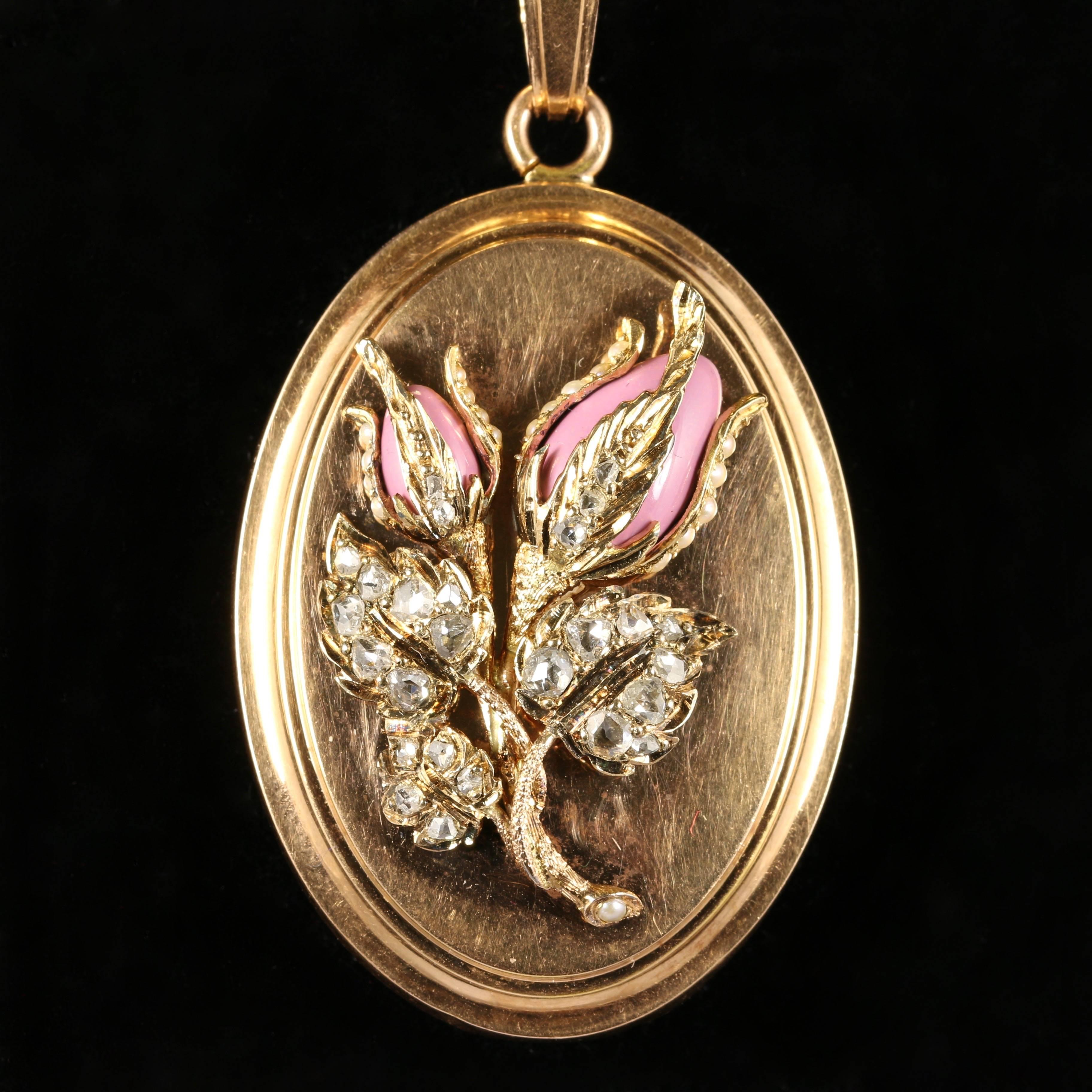 This is absolutely breath-taking, a fabulous French 18ct yellow gold collar and solid gold locket which is adorned with pink flowers which are diamond set.

This has to be one of the nicest lockets and collars we have ever had the pleasure of
