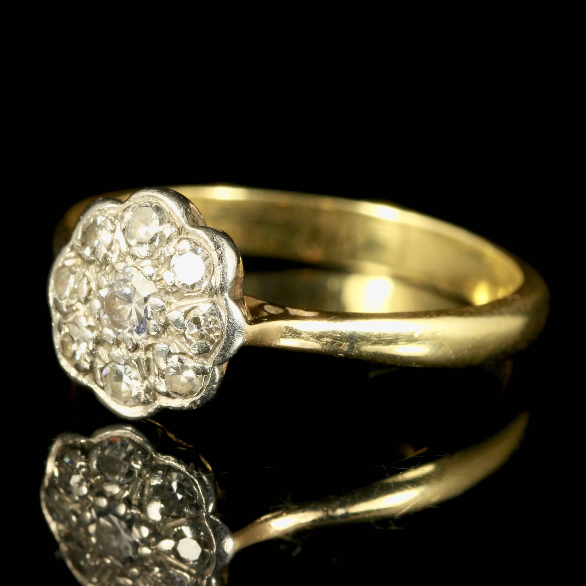 This stunning Edwardian rose cut diamond cluster ring is set with 0.50ct of old cut diamonds.

Hallmarked 18ct set in 18ct yellow gold and platinum. 

The centre diamond is 0.10ct with 0.05ct chasing around the gallery.

The diamonds are SI 1/2 H/I