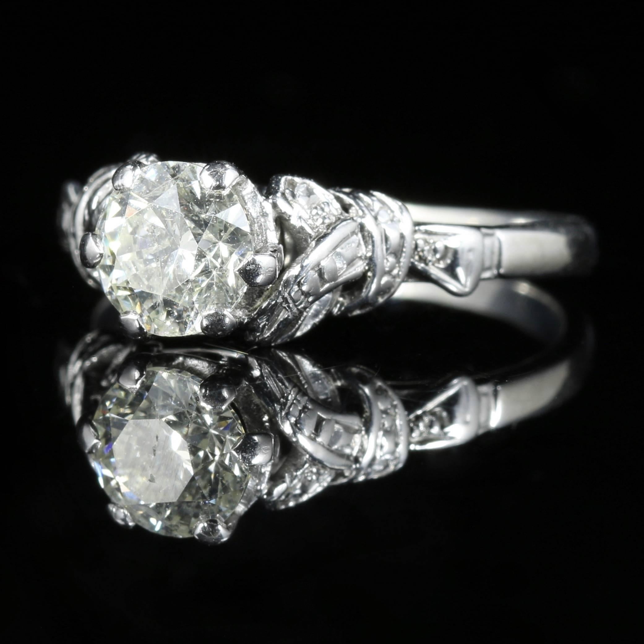 This beautiful Antique Edwardian Diamond solitaire ring is set in platinum. 

Circa 1915.

Boasting a 0.80ct old cut Diamond which is SI2 I/J Colour.

The diamond sparkles continuously and beautifully captivating the allure of natures