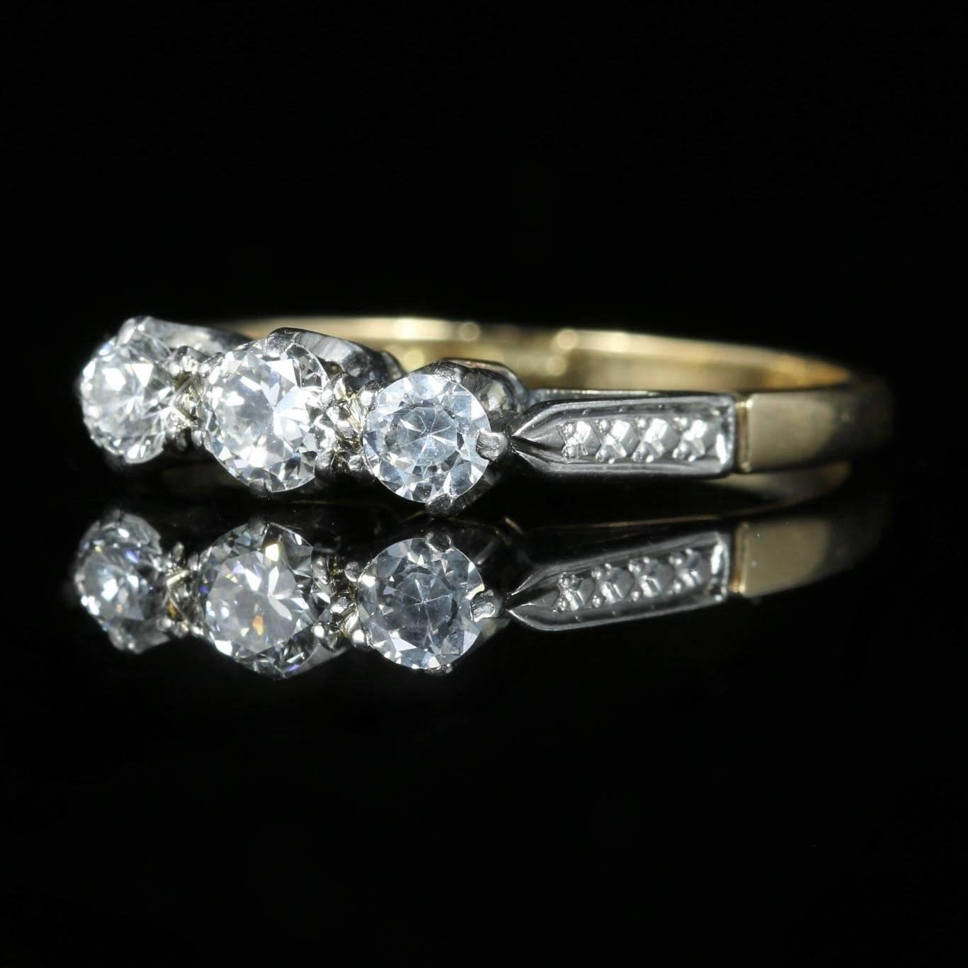 This stunning Antique 18ct yellow Gold and Platinum Diamond trilogy ring boasts a gallery of Diamonds that are all original to the setting.

A lovely Antique Edwardian Victorian Diamond ring.

Circa 1915

It is hallmarked 18ct and Plat.

Set with a