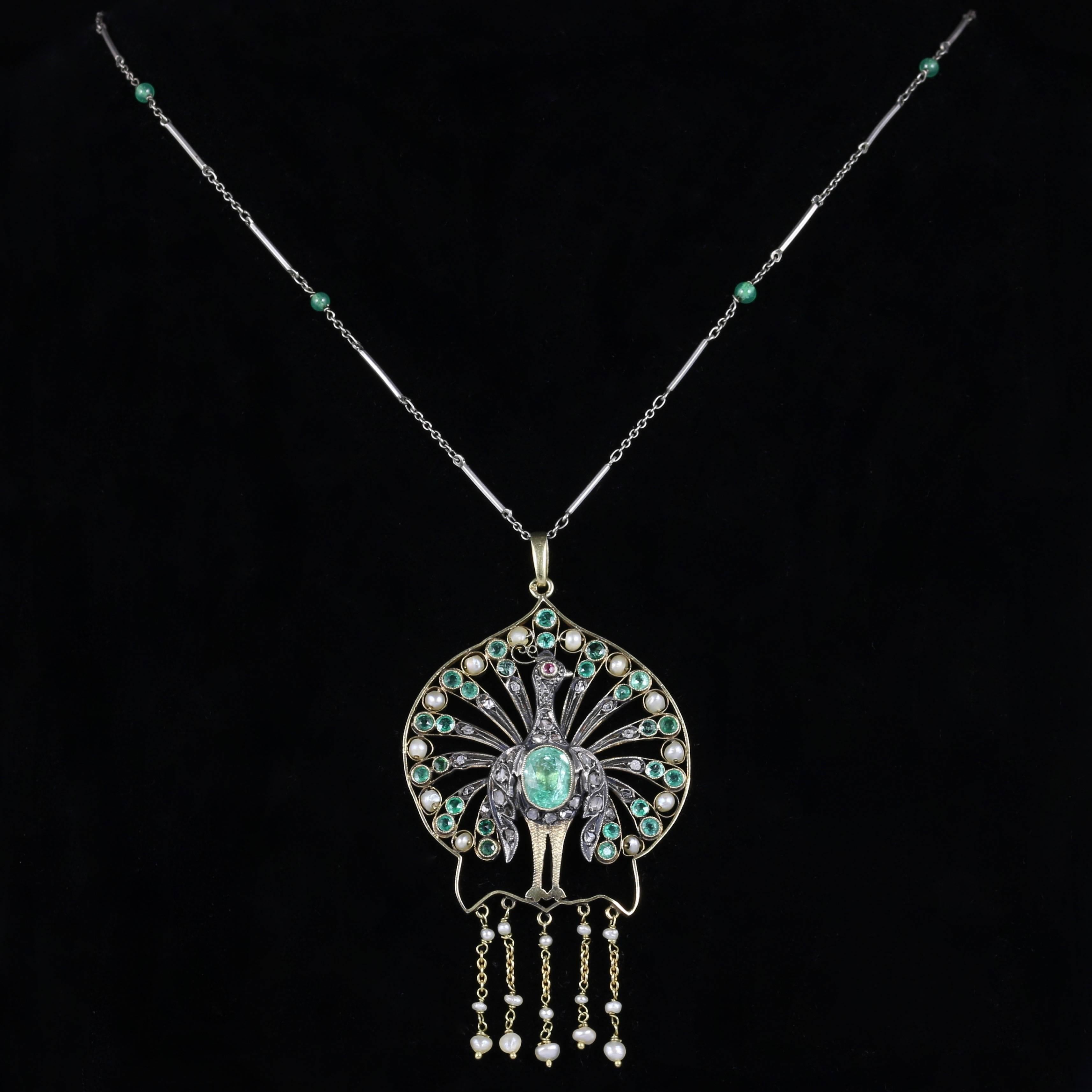 This genuine French Antique Victorian Emerald Peacock necklace is exceptional, it really is one of the most outstanding peacock pendants we have ever exhibited for sale.

Circa 1880

Set with fabulous rich green peacocks on a Platinum chain leading