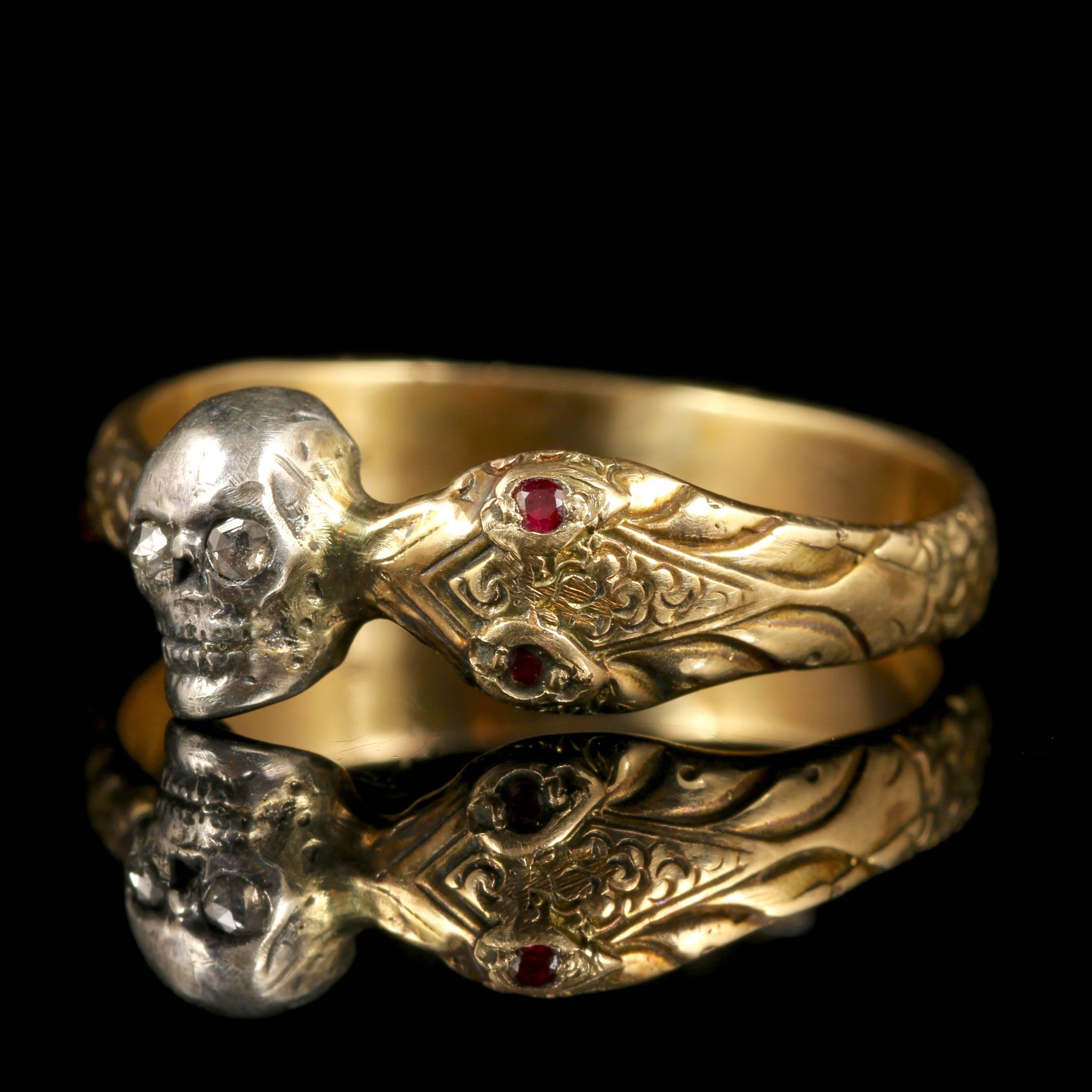 This 18ct Yellow Gold Memento Mori Diamond Skull and Snake ring is stunning.

Skull jewellery (Memento Mori) is very collectable. 

Memento Mori means -Remember that you must die- and to cherish each day as it is a reminder of the imminence of both