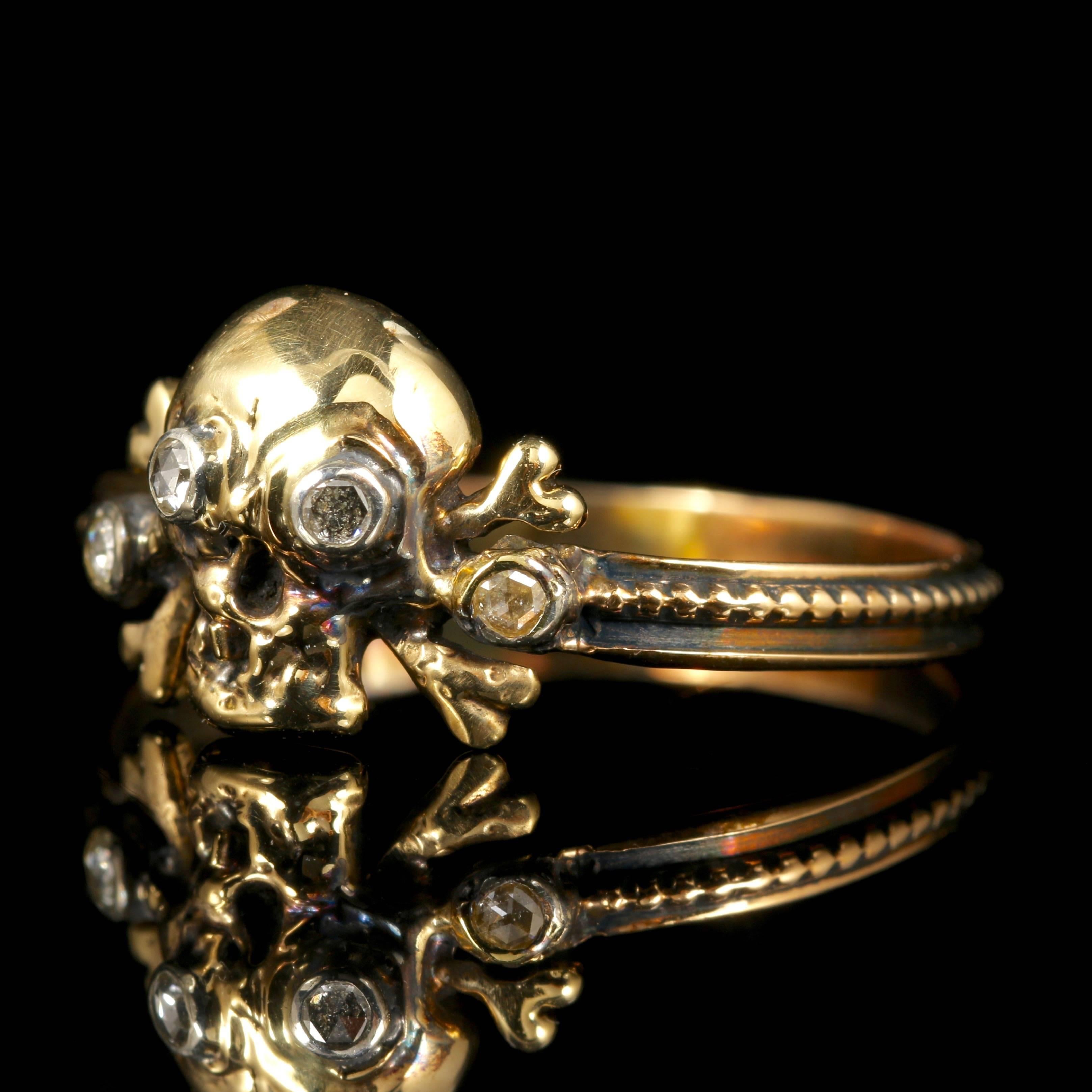 This 18ct Yellow Gold Memento Mori Diamond Skull and cross bone ring is fabulous.

Skull jewellery (Memento Mori) is very collectable. 

During the 17th Century Memento Mori jewellery was decorated with skulls, crossbones, skeletons, coffins, and