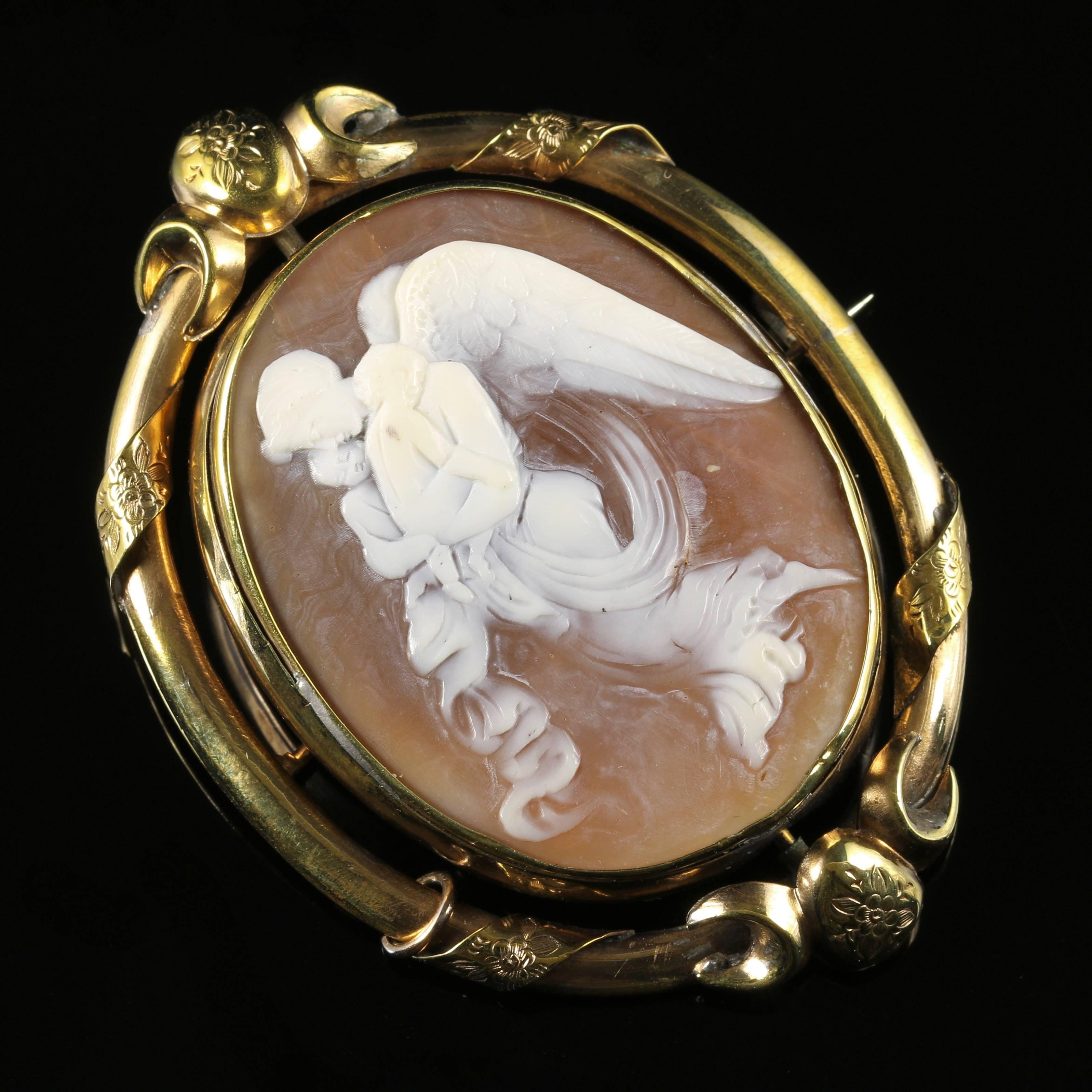 This beautiful Victorian Antique bull mouth shell cameo brooch is a swivel mount, set in a lovely ornate frame.

Purchased in London and steeped in English history.

The lovely brooch has a central swivel so the brooch can be worn both ways.

The